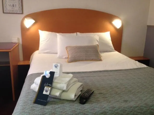 Bed in Quick Palace Lyon Saint-Priest