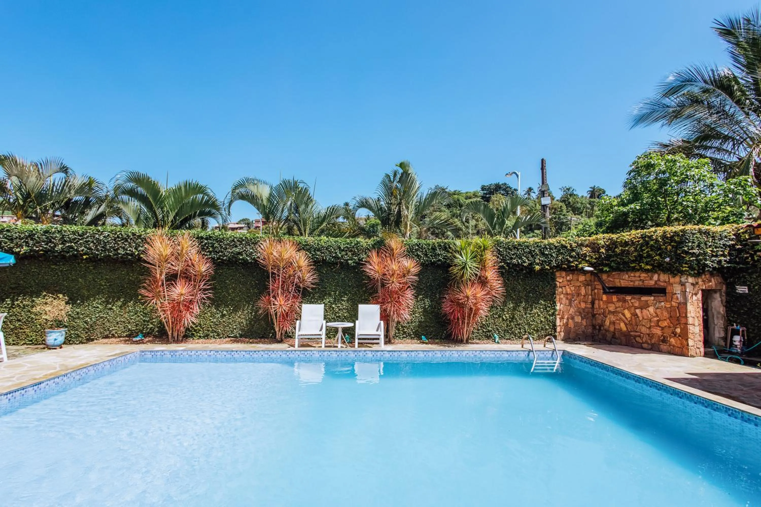 Pool view in VELINN Pousada Casa de Pedra Ilhabela