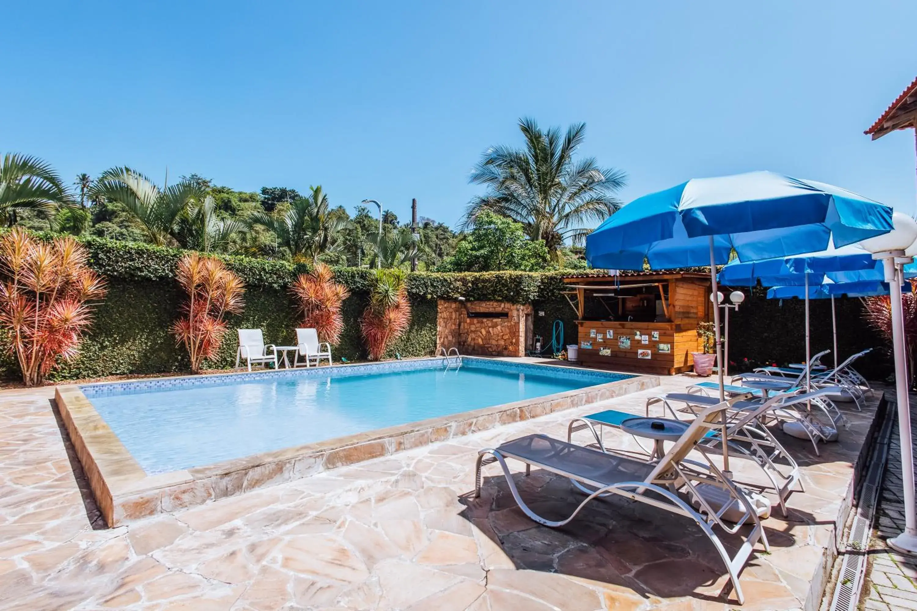 Swimming pool in VELINN Pousada Casa de Pedra Ilhabela Swimming pool in VELINN Pousada Casa de Pedra Ilhabela