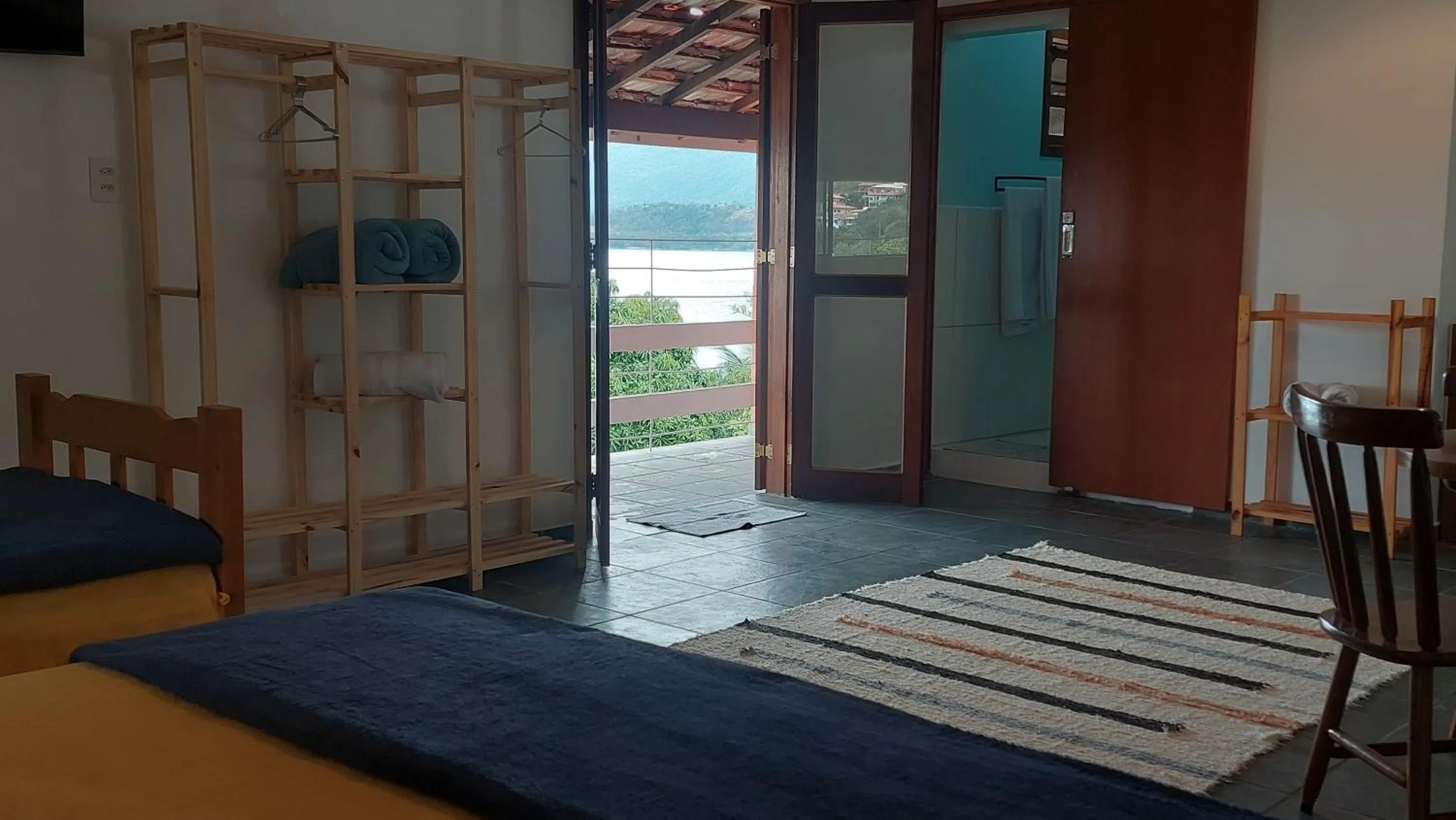 Bed in Pousada Sol do Araçá