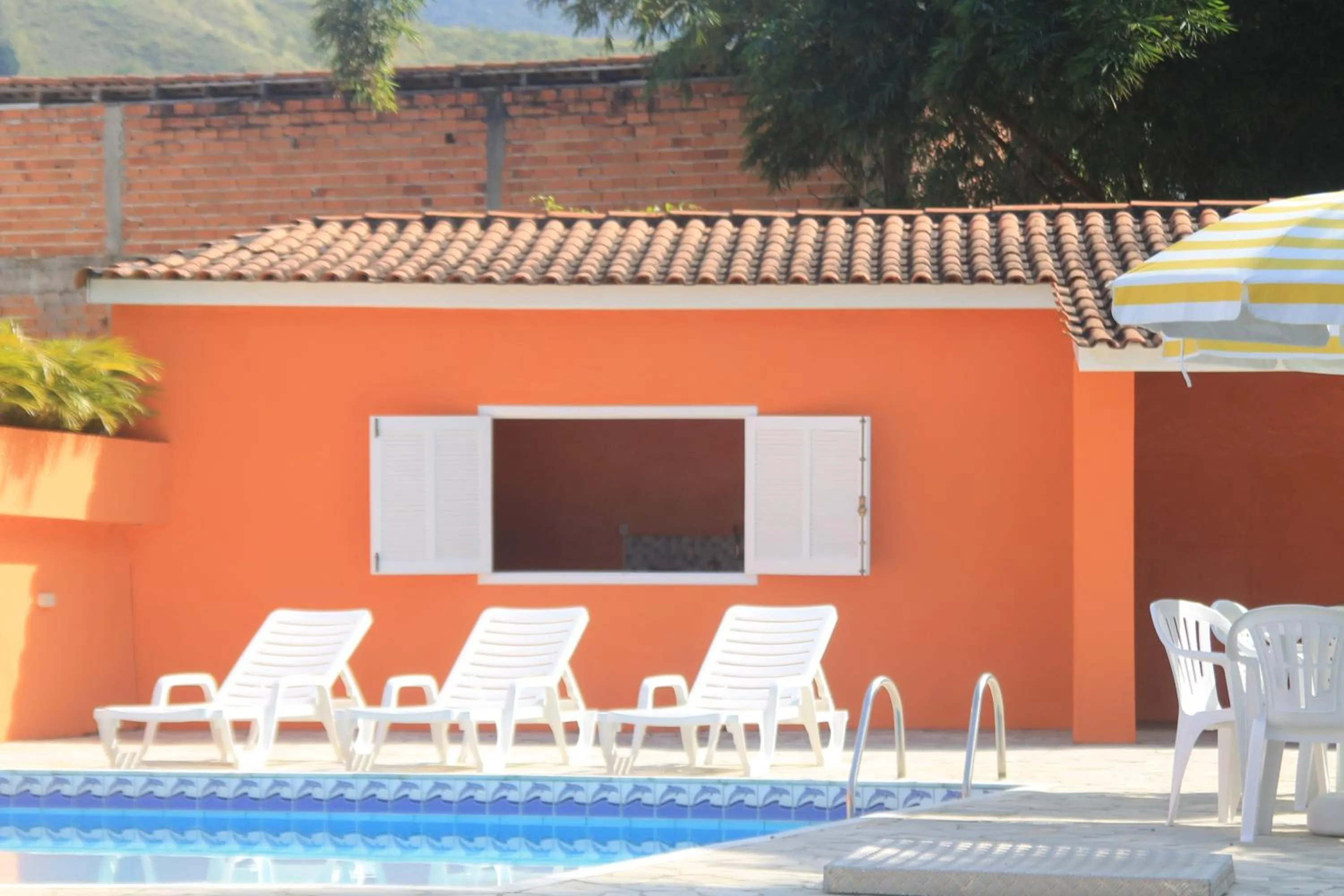Swimming pool in Pousada Sol do Araçá