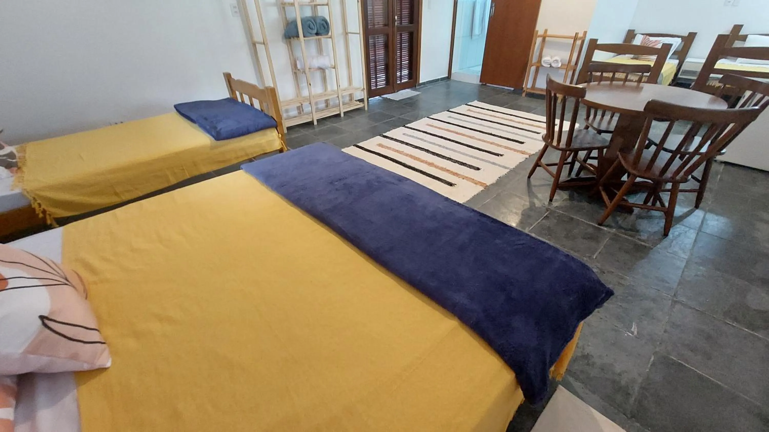 Bed in Pousada Sol do Araçá