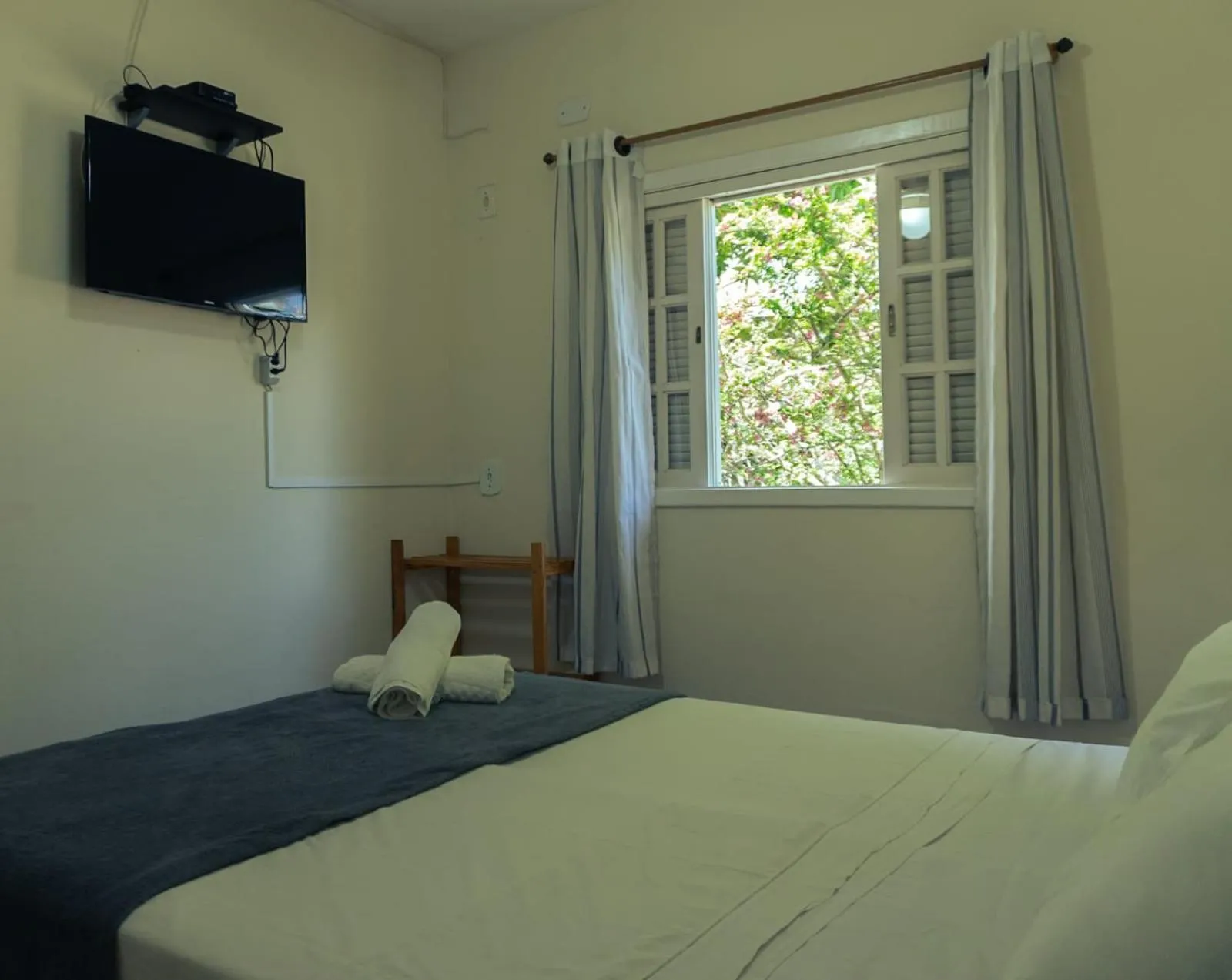 Bed in Pousada Sol do Araçá