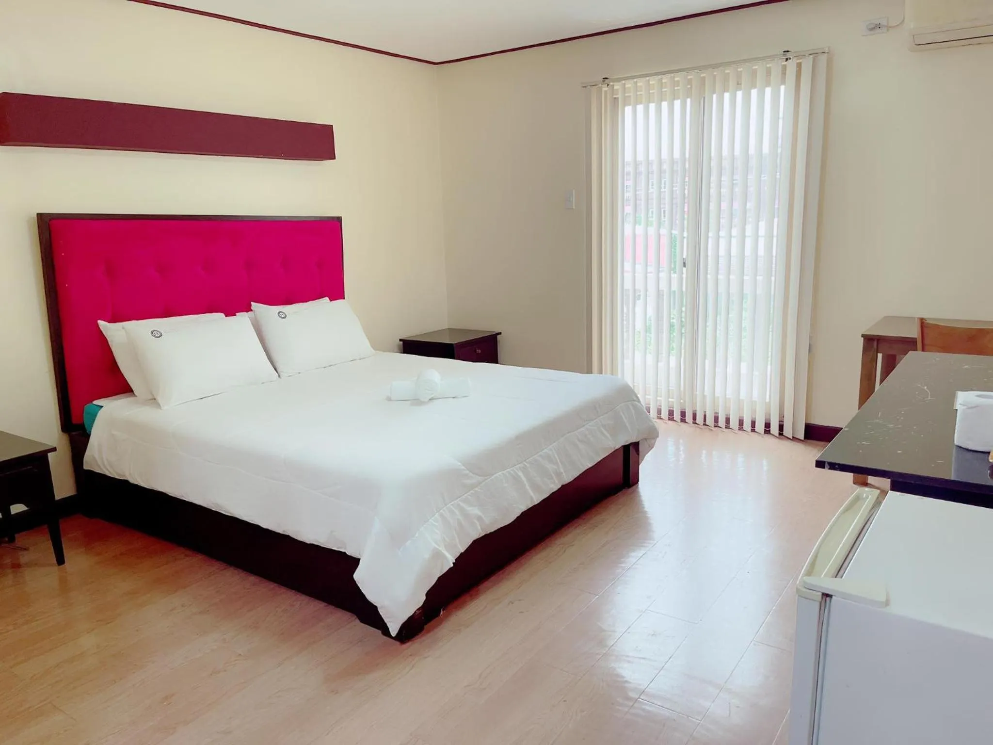 Bed in Jun and Helen Hotel and Restaurant