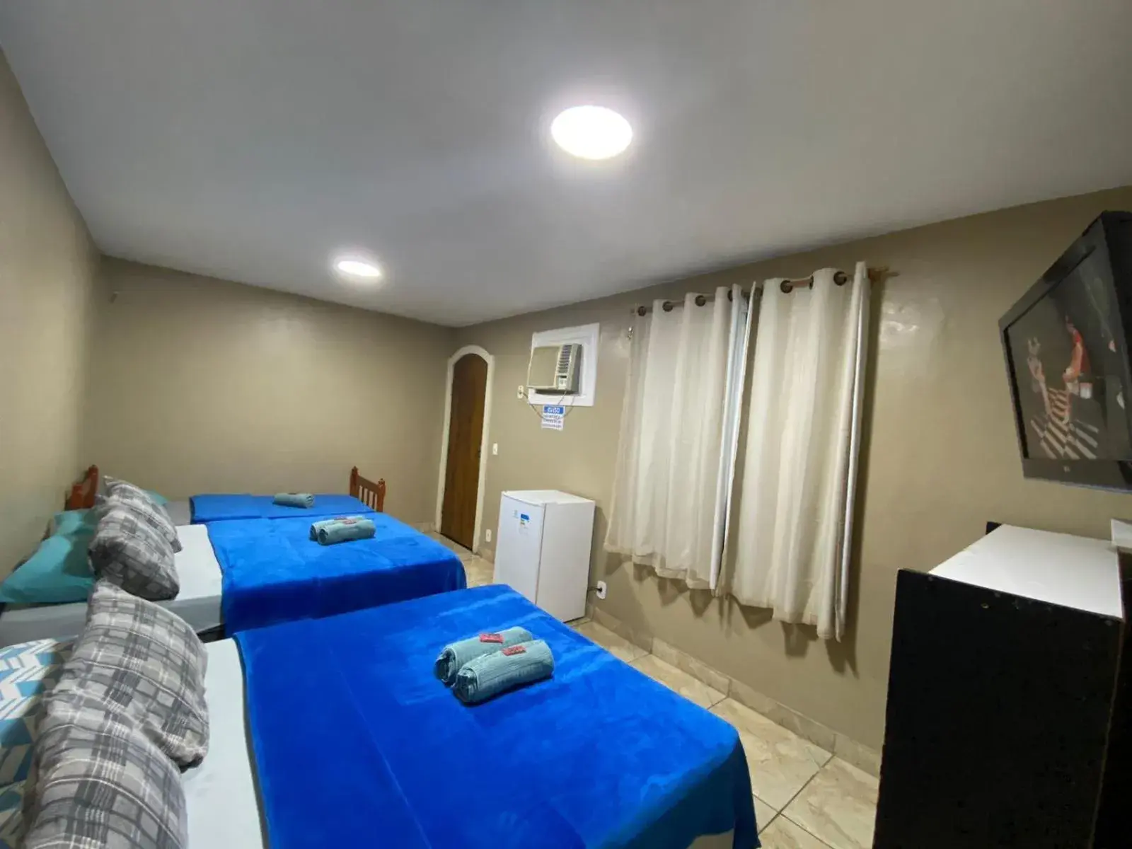 Quadruple Room with Private Bathroom in Lurviz Home Suítes Quadruple Room with Private Bathroom in Lurviz Home Suítes