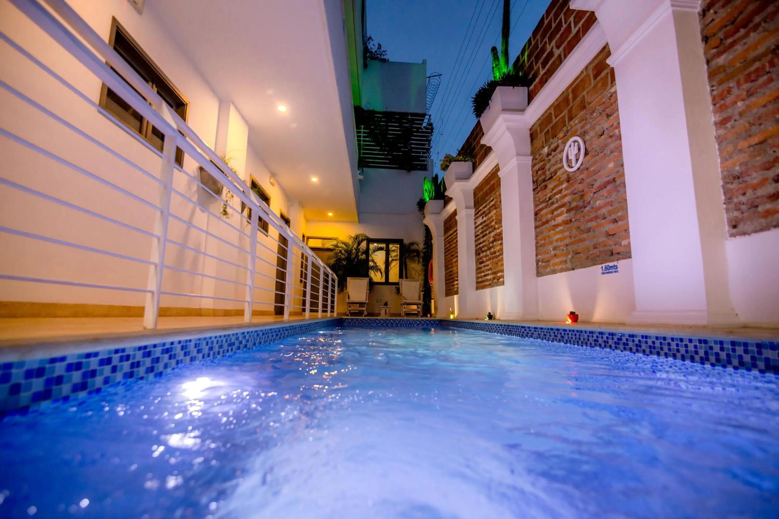 Swimming pool in El Cactus Luxury Apartments in Historic Center