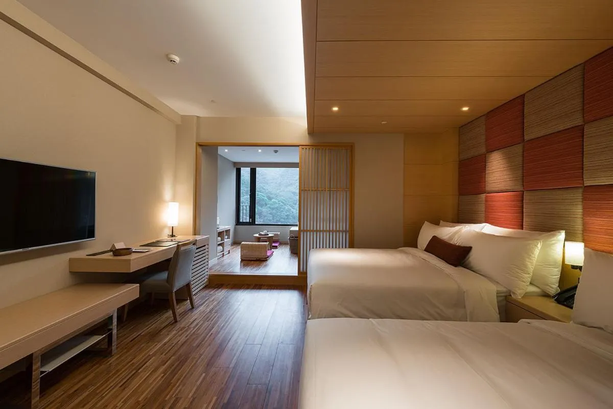 Bed in Asia Pacific Hotel Beitou