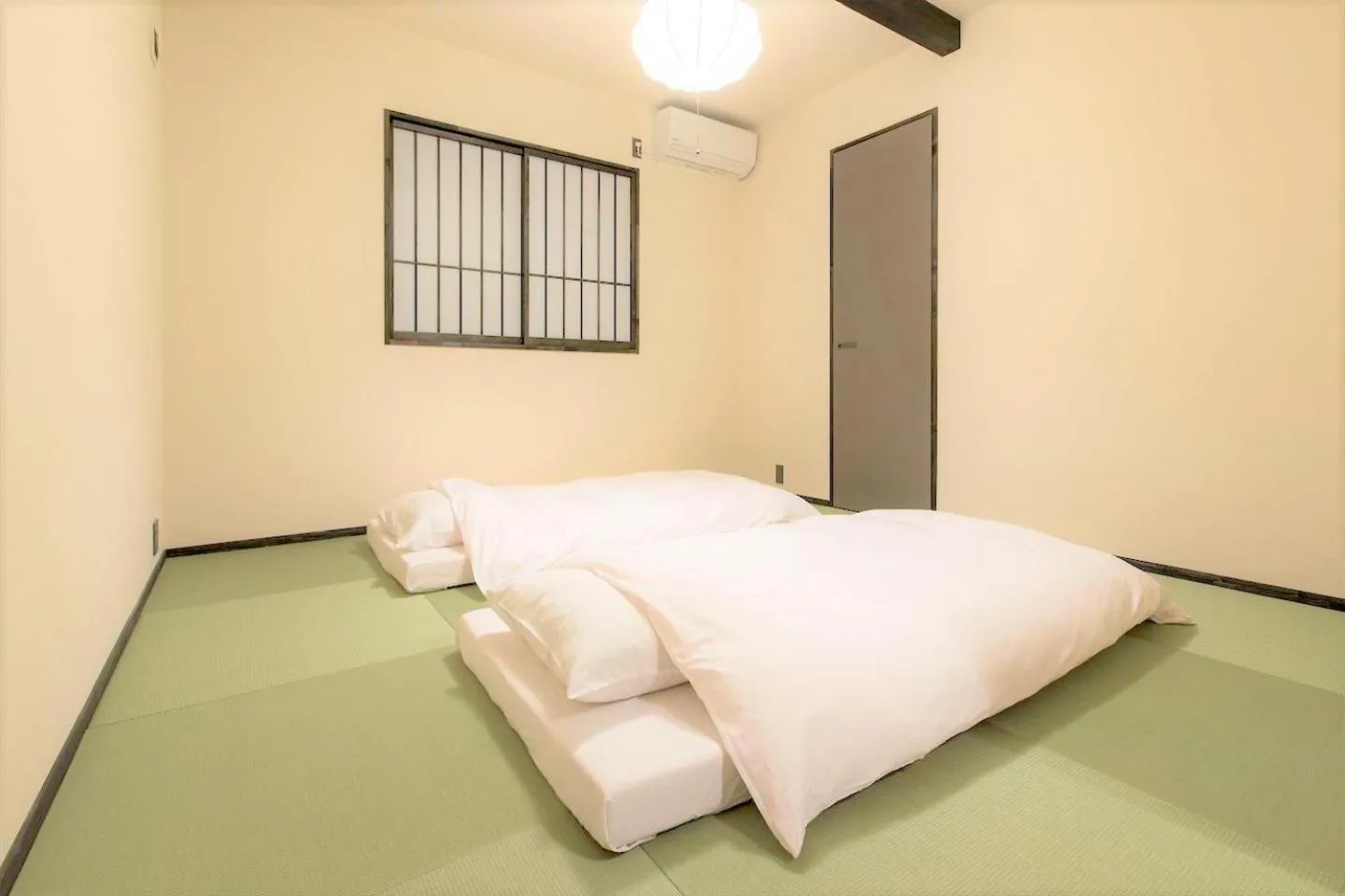 Bedroom, Bed in MUSUBI HOTEL MACHIYA Haruyoshi