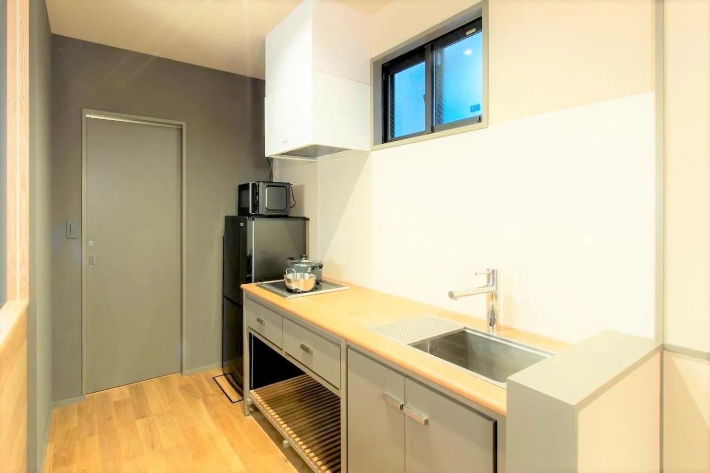 Kitchen or kitchenette in MUSUBI HOTEL MACHIYA Haruyoshi