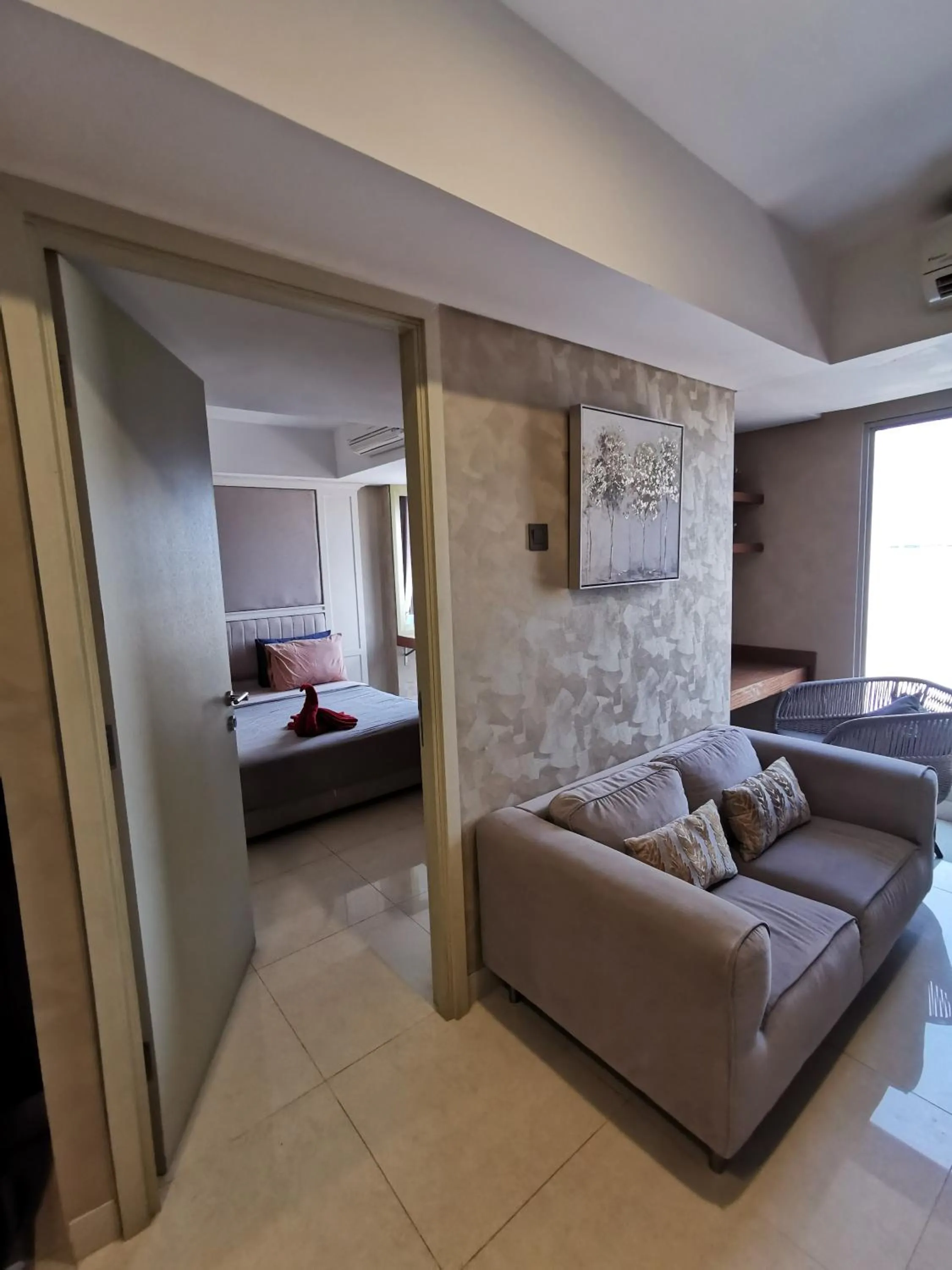 Living room, Bed in Warhol Residence Semarang Simpang Lima