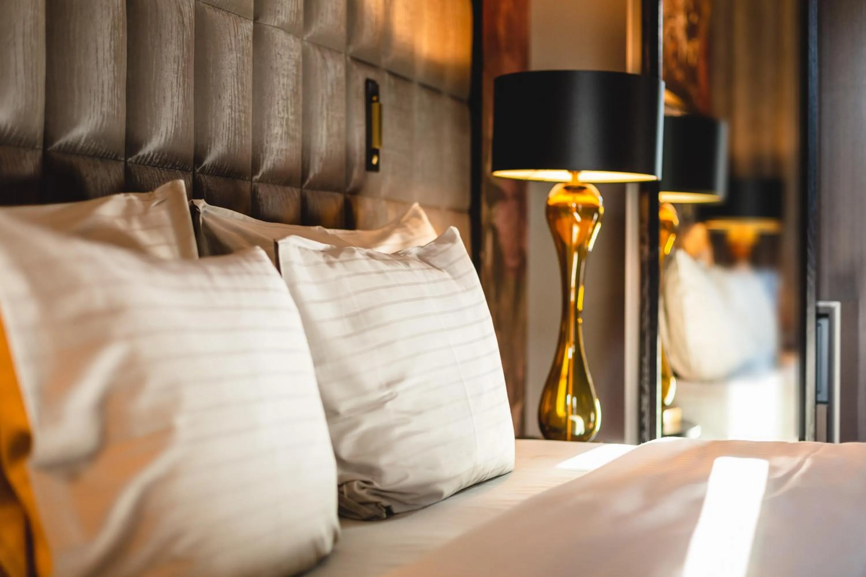 Bed in Grand Poet Hotel and SPA by Semarah