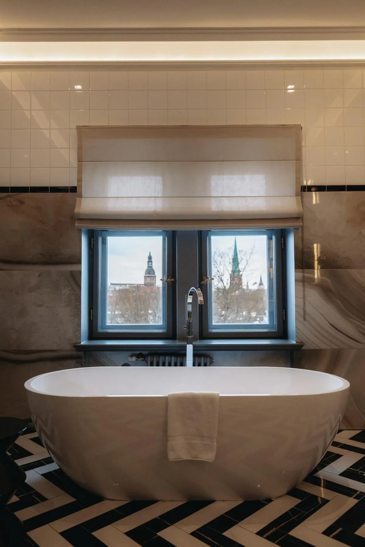 Bathroom in Grand Poet Hotel and SPA by Semarah