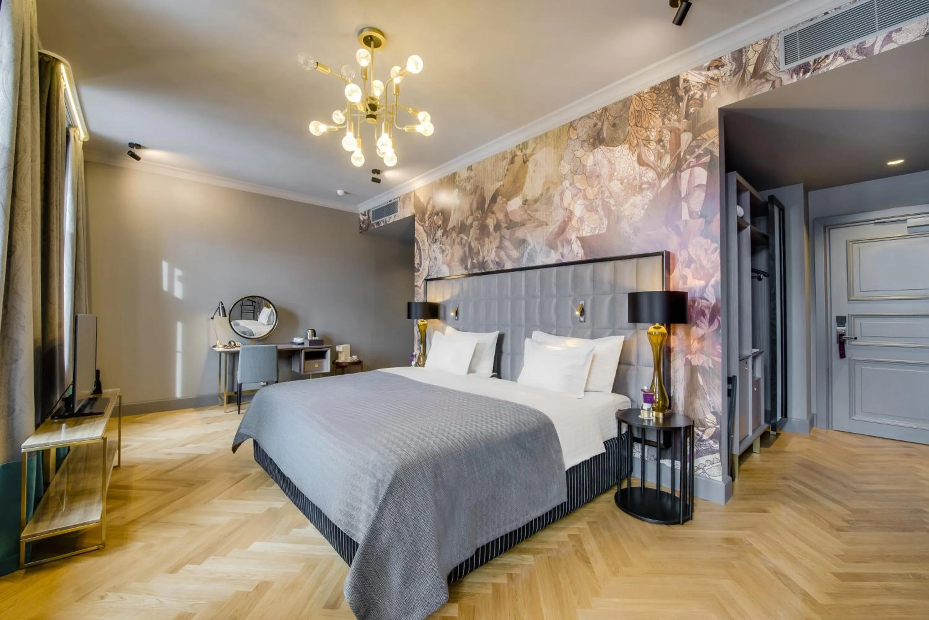 Bed in Grand Poet Hotel and SPA by Semarah