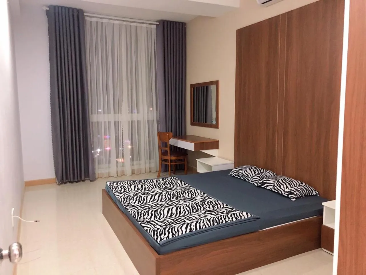 Bed in The Grand Condotel