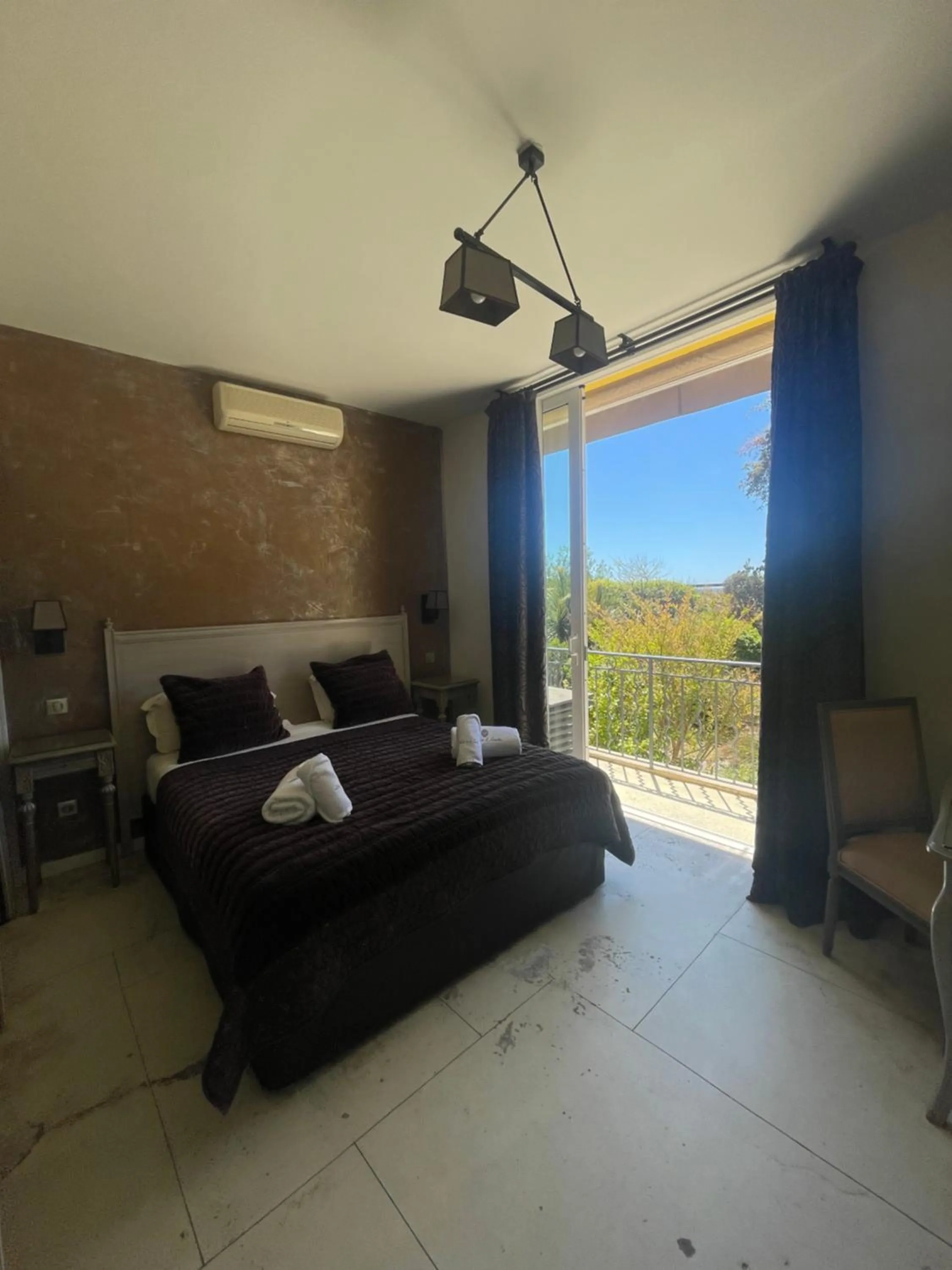 Bedroom in Hôtel de La Fossette