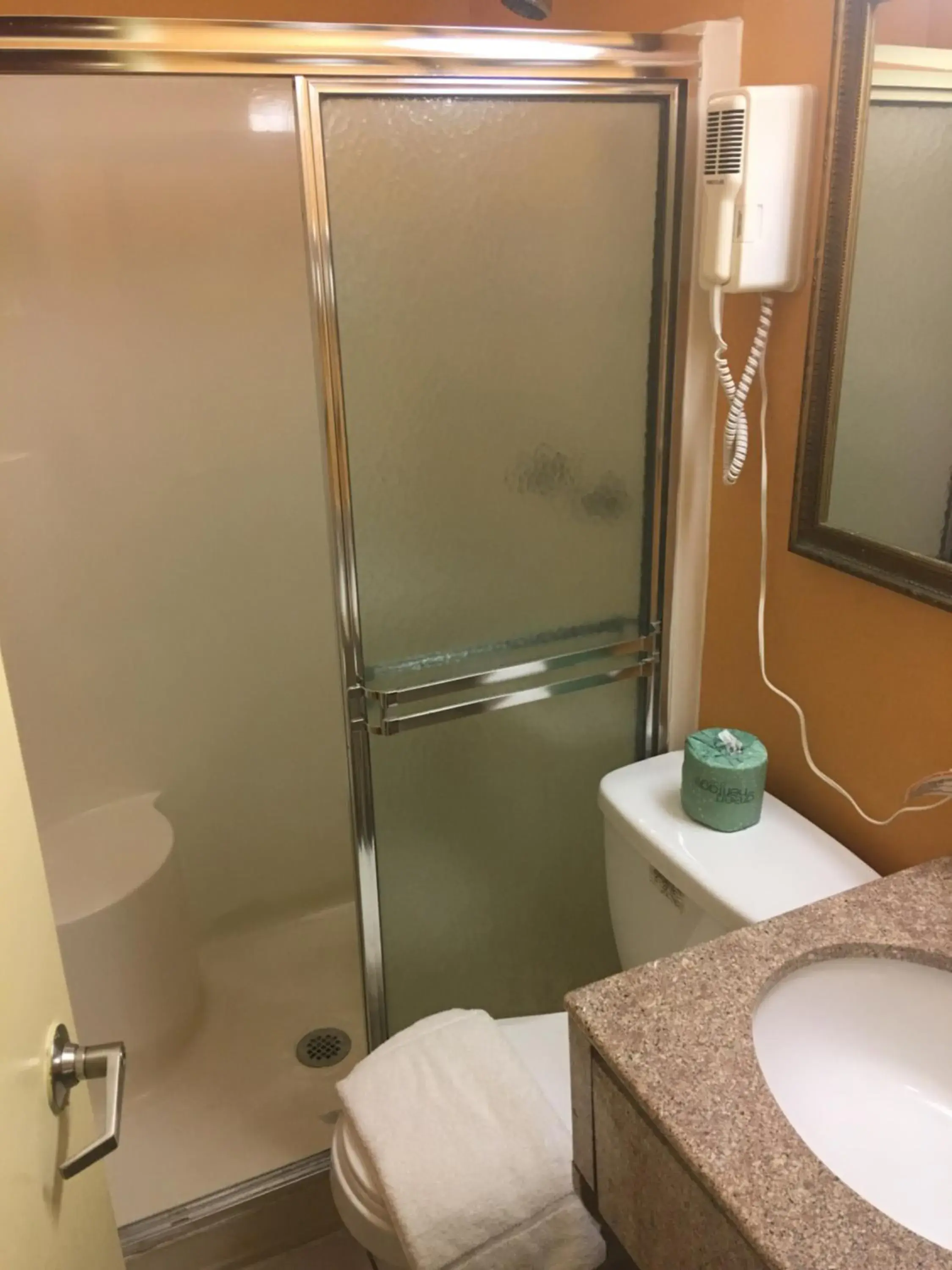 Bathroom in Travelodge by Wyndham Bay Shore Long Island