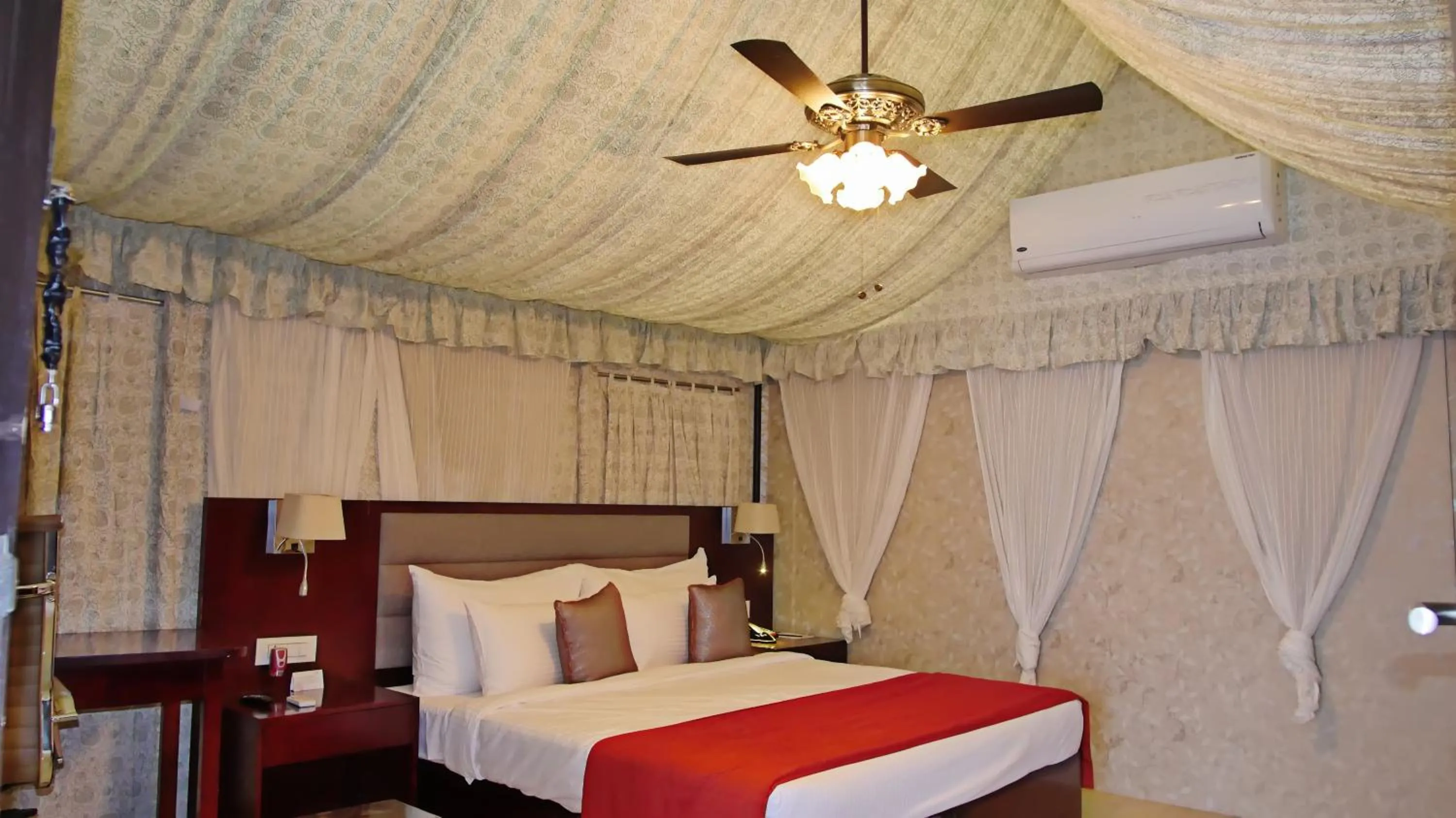 Staff, Bed in Pride Hotel & Convention Centre Indore