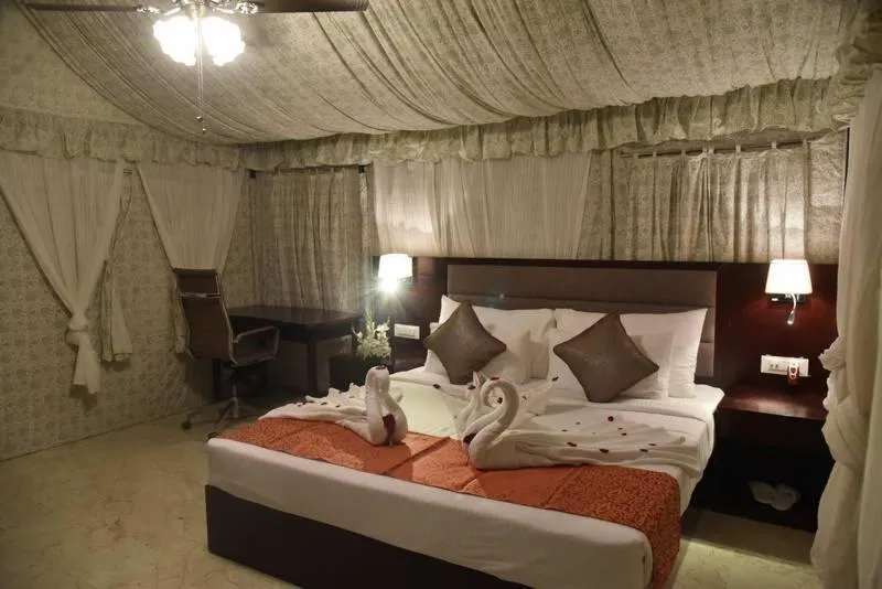 Staff, Bed in Pride Hotel & Convention Centre Indore