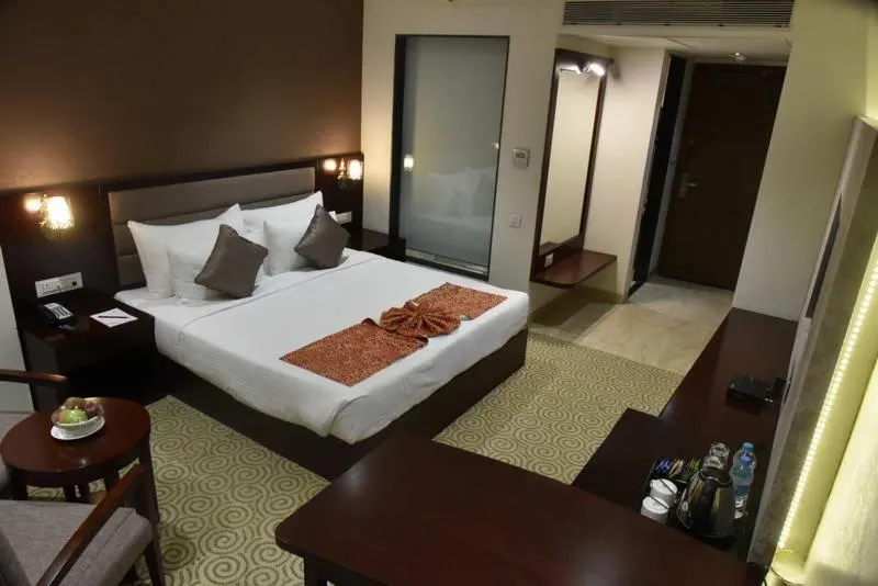 Bathroom, Bed in Pride Hotel & Convention Centre Indore