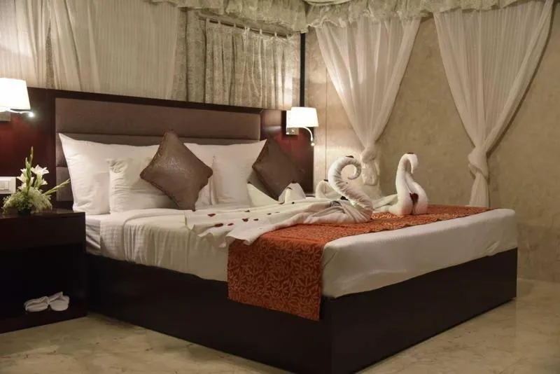 People, Bed in Pride Hotel & Convention Centre Indore