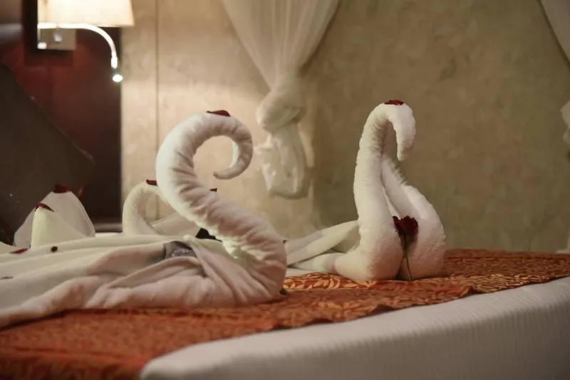 Staff, Bed in Pride Hotel & Convention Centre Indore