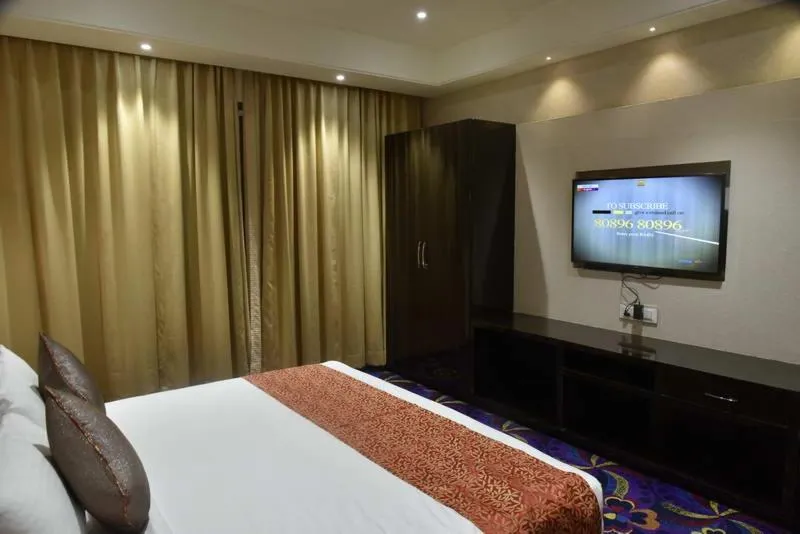 Bathroom, Bed in Pride Hotel & Convention Centre Indore