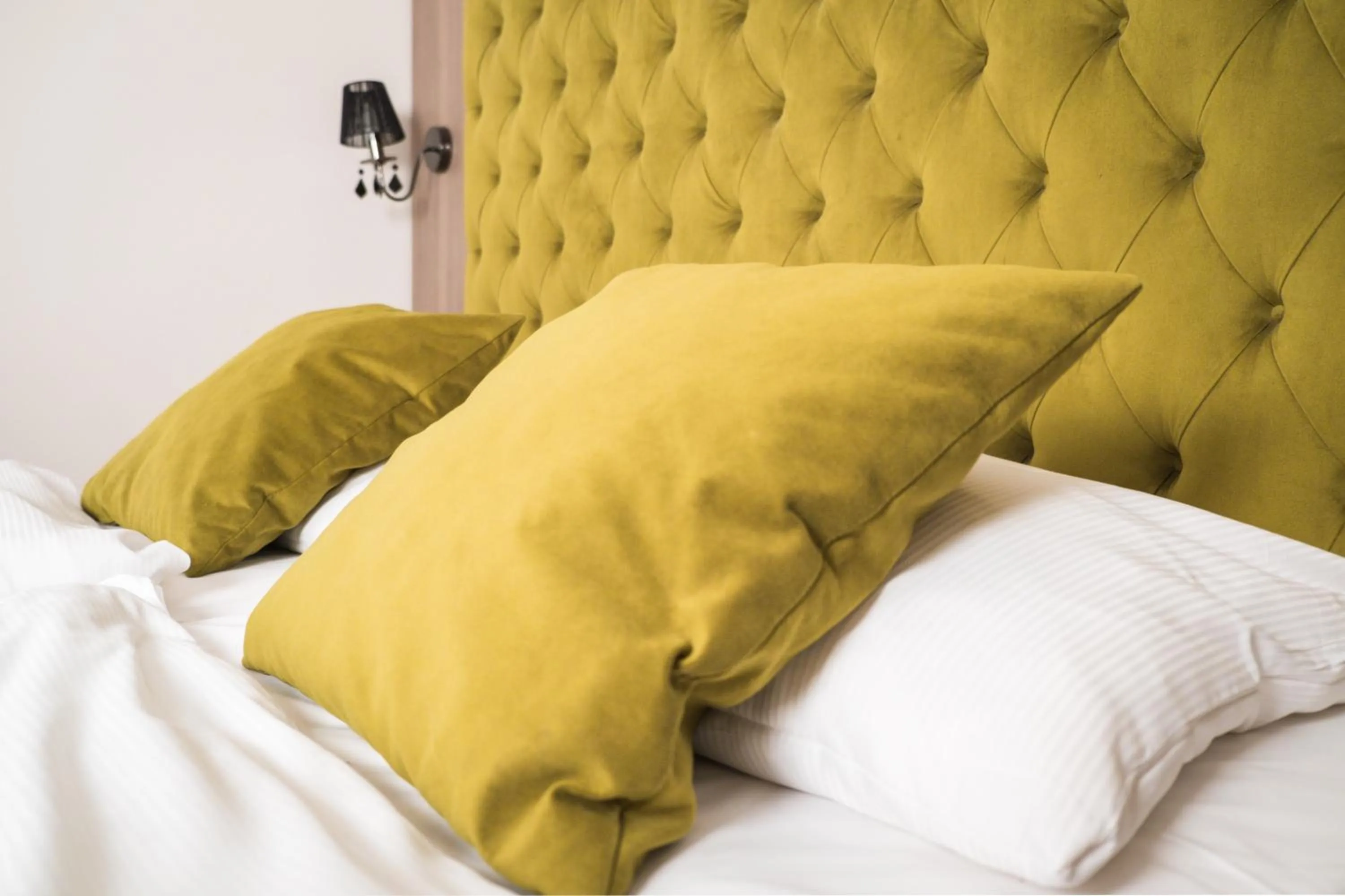 Bed in City Boutique Hotel