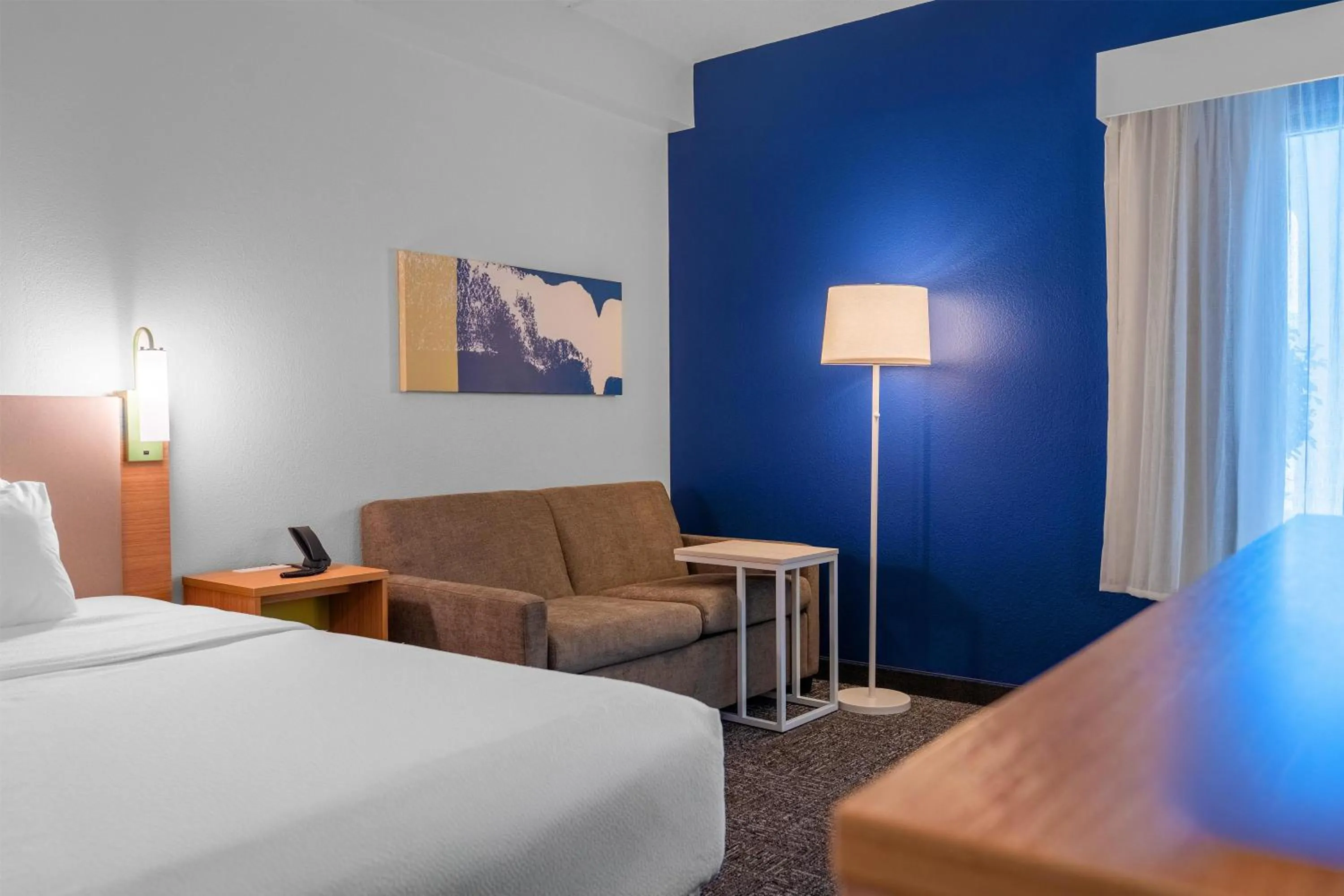 Living room, Bed in Spark by Hilton Atlanta Kennesaw Town Center