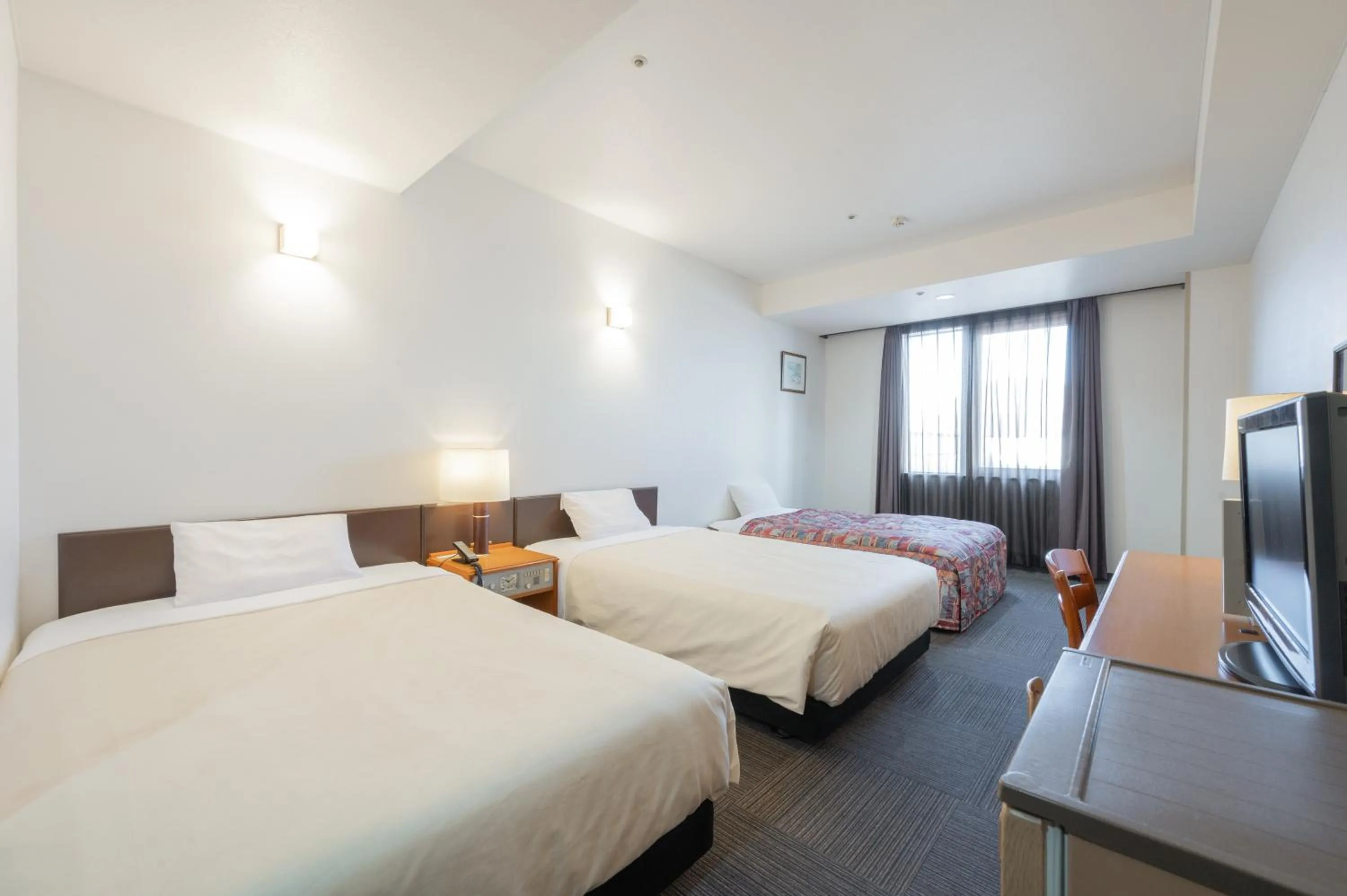 Bed in Hotel Hakodate Royal Seaside BBH Hotel Group