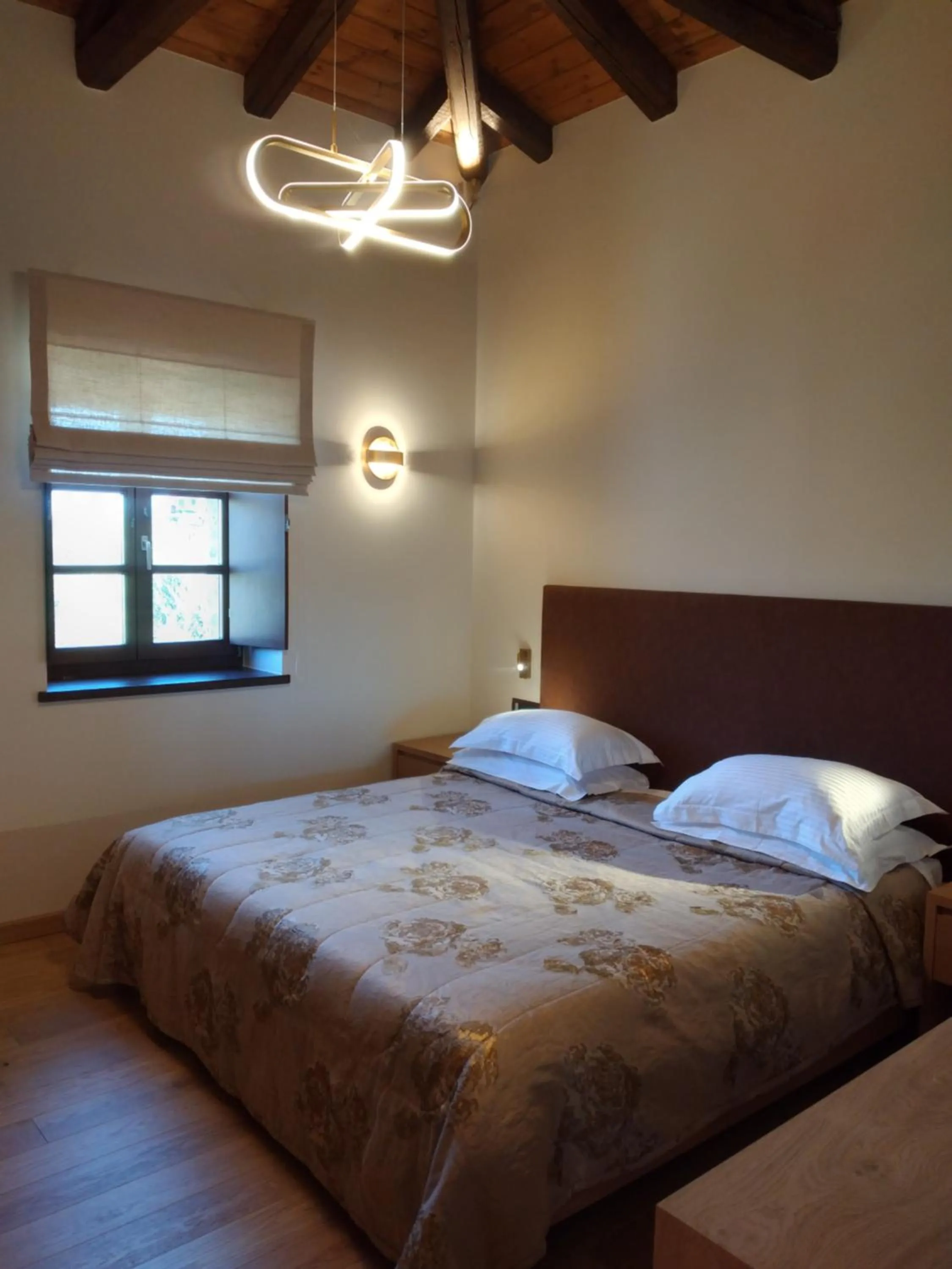 Bed in Mystras Grand Palace Resort & Spa