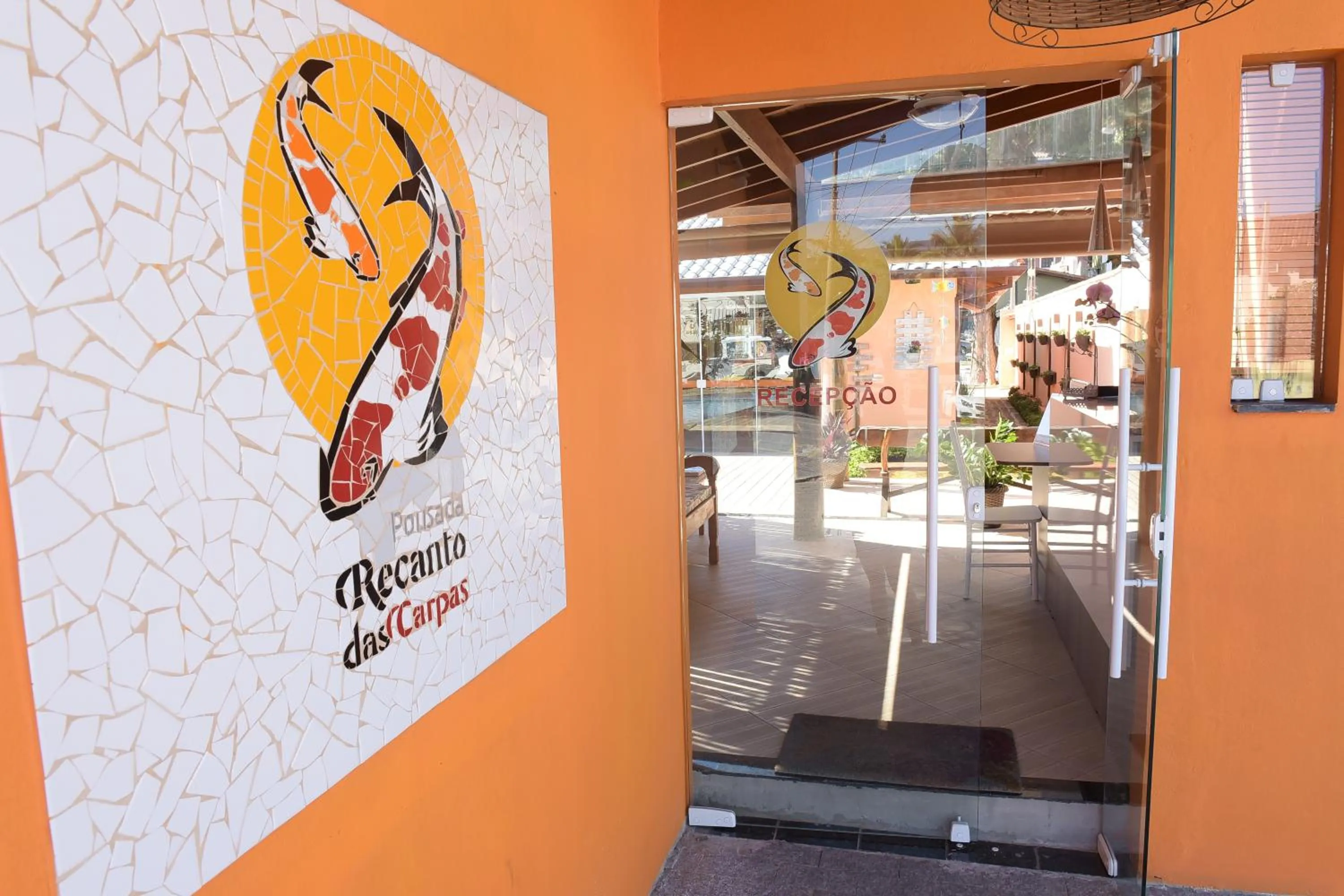 Property logo or sign in Recanto das Carpas