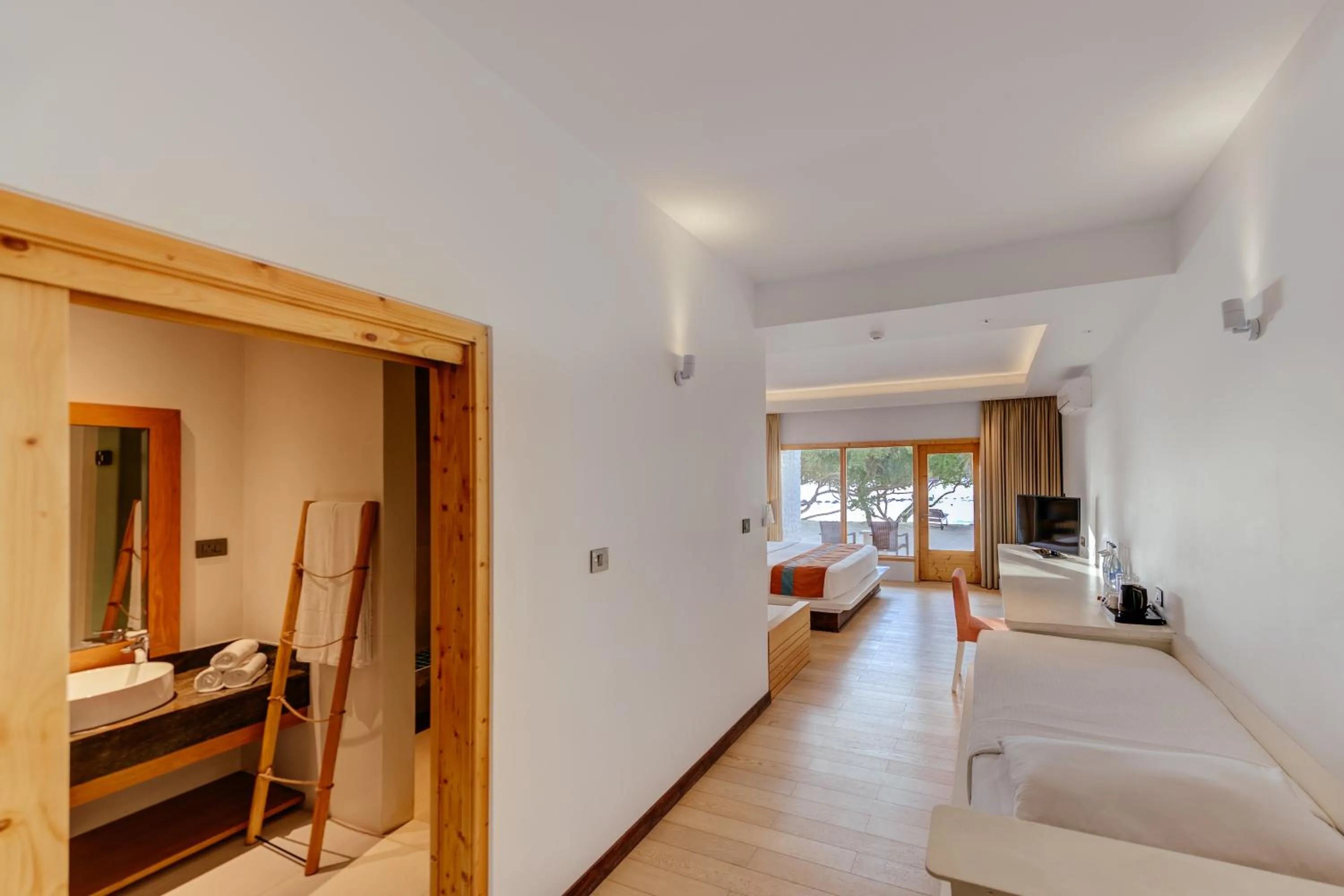 Photo of the whole room, Bed in Cinnamon Dhonveli Maldives - Free One-Way Speedboat and 02 Kids Under 12 Stay & Dine Free