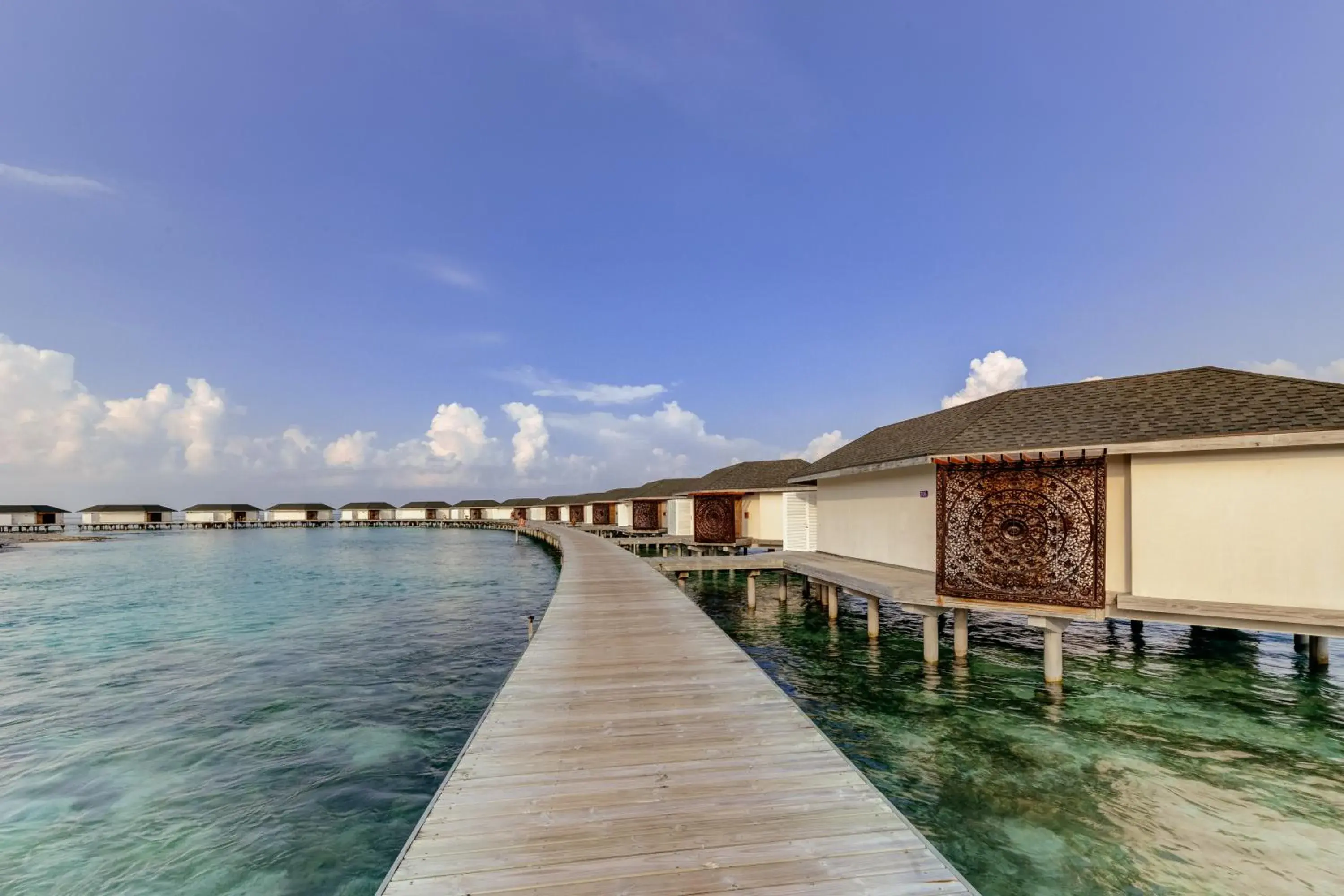 Property building in Cinnamon Dhonveli Maldives - Free One-Way Speedboat and 02 Kids Under 12 Stay & Dine Free Property building in Cinnamon Dhonveli Maldives - Free One-Way Speedboat and 02 Kids Under 12 Stay & Dine Free