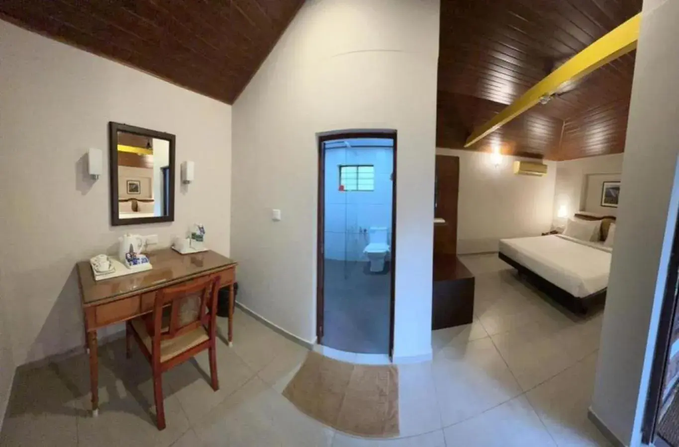 Photo of the whole room, Bed in Abad Harmonia Ayurvedic Beach Resort Photo of the whole room, Bed in Abad Harmonia Ayurvedic Beach Resort