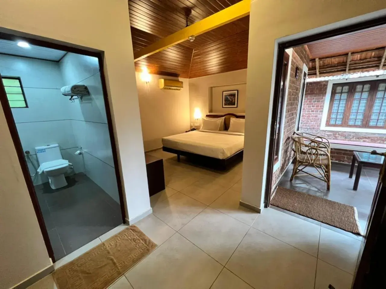 Photo of the whole room, Bed in Abad Harmonia Ayurvedic Beach Resort Photo of the whole room, Bed in Abad Harmonia Ayurvedic Beach Resort