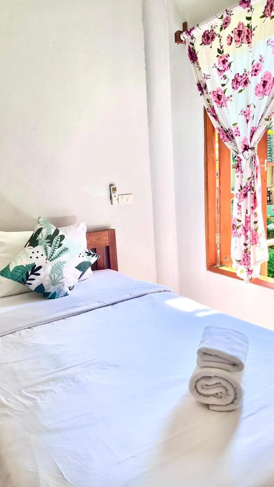 Bed in Pai Flora Resort