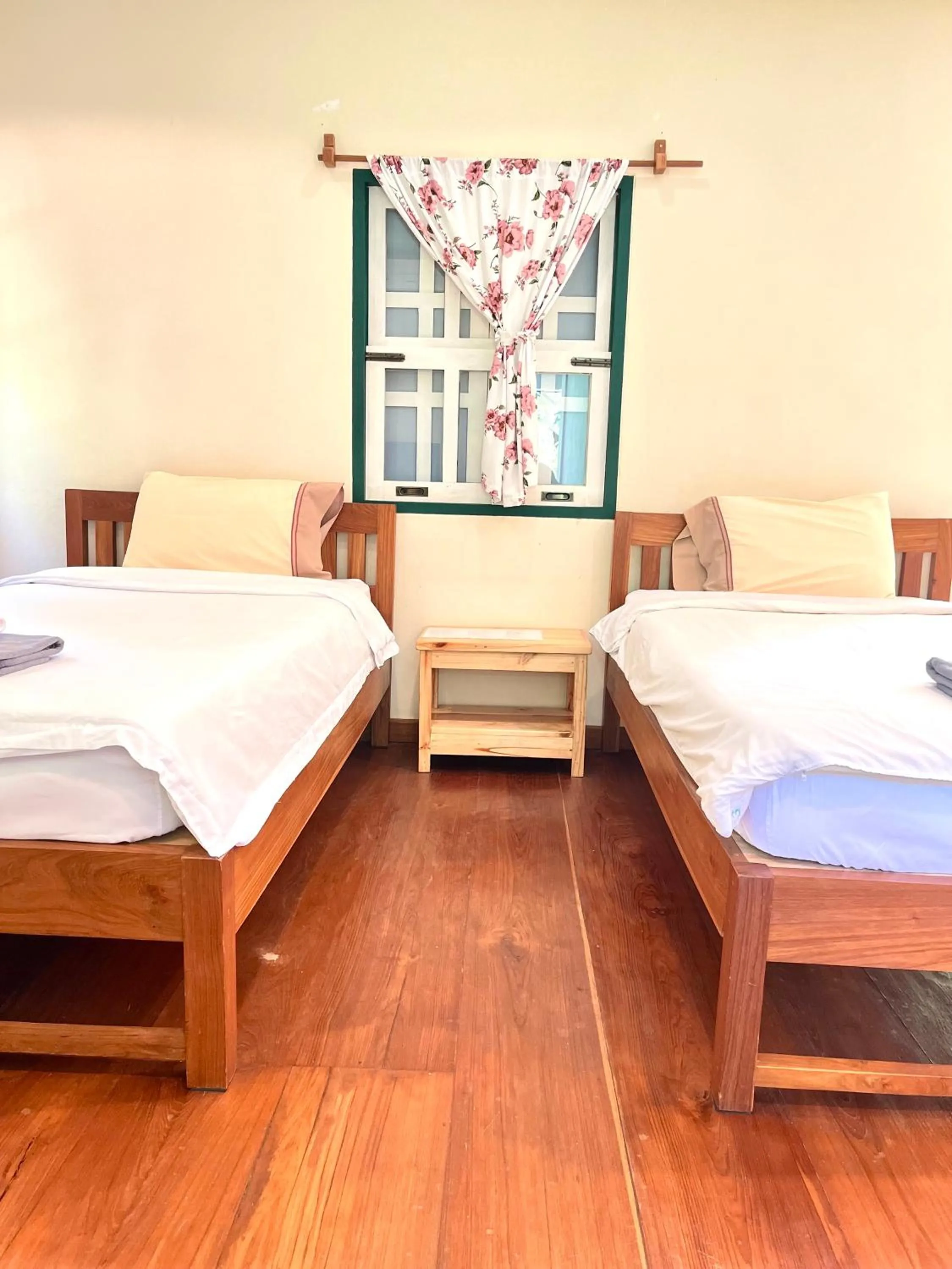 Bed in Pai Flora Resort