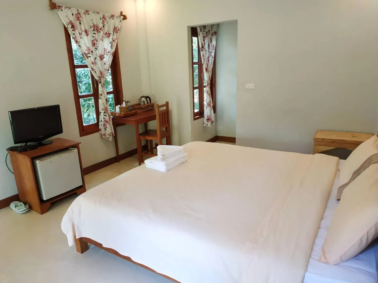 Bed in Pai Flora Resort