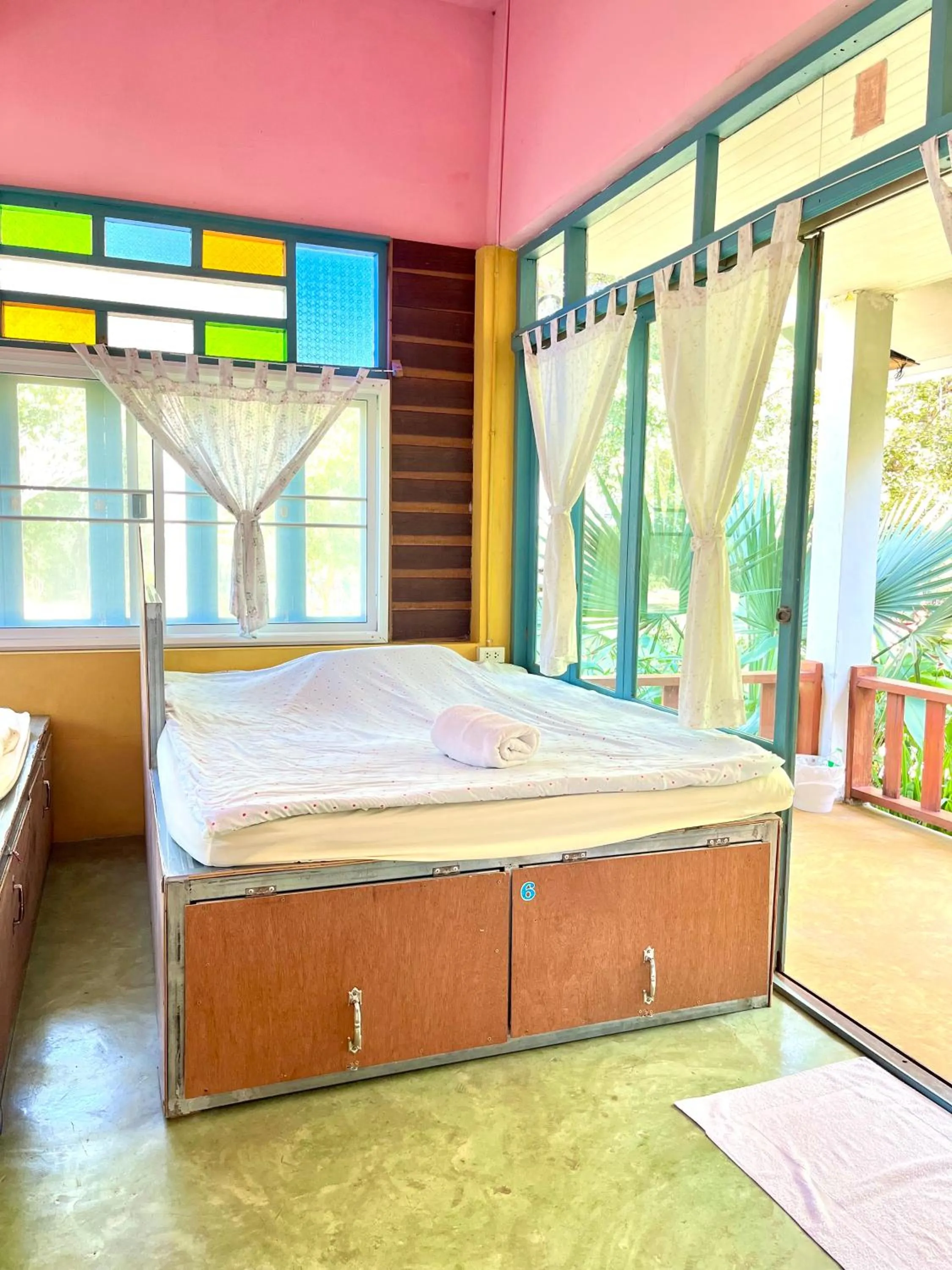 Bed in Pai Flora Resort