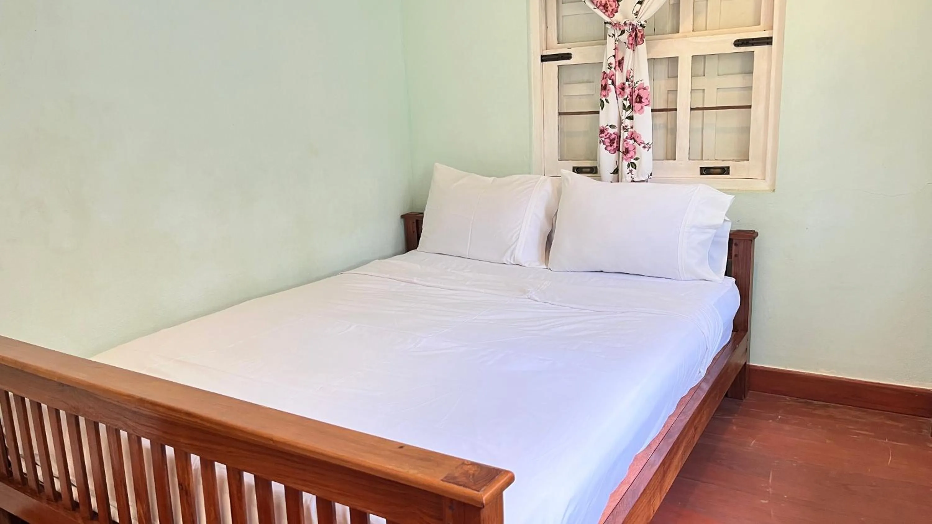 Bed in Pai Flora Resort