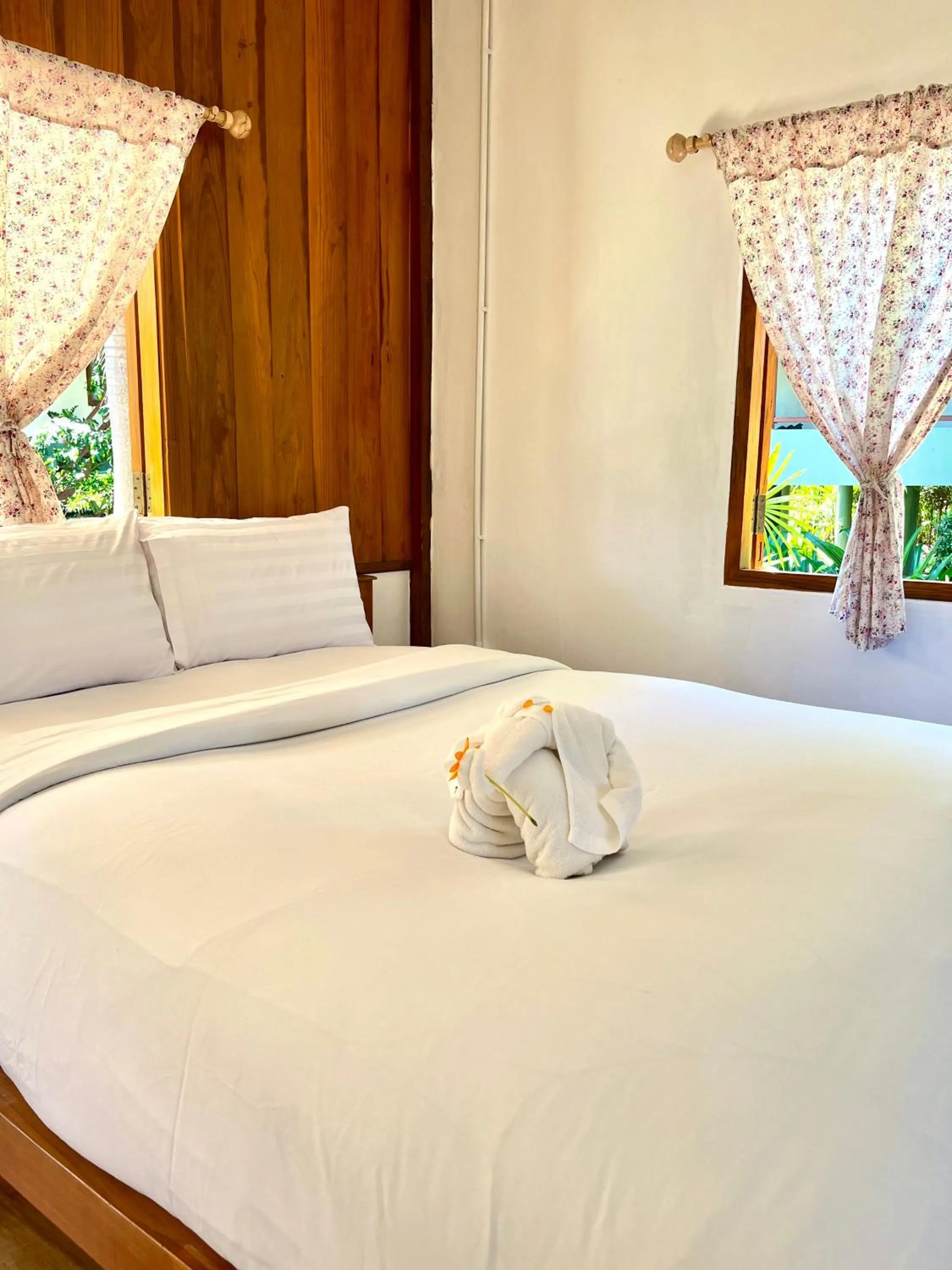 Bed in Pai Flora Resort