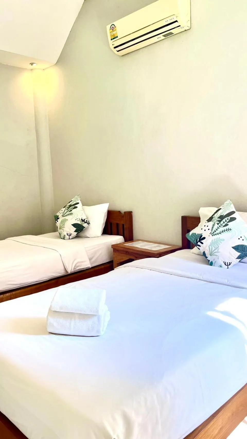 Bed in Pai Flora Resort