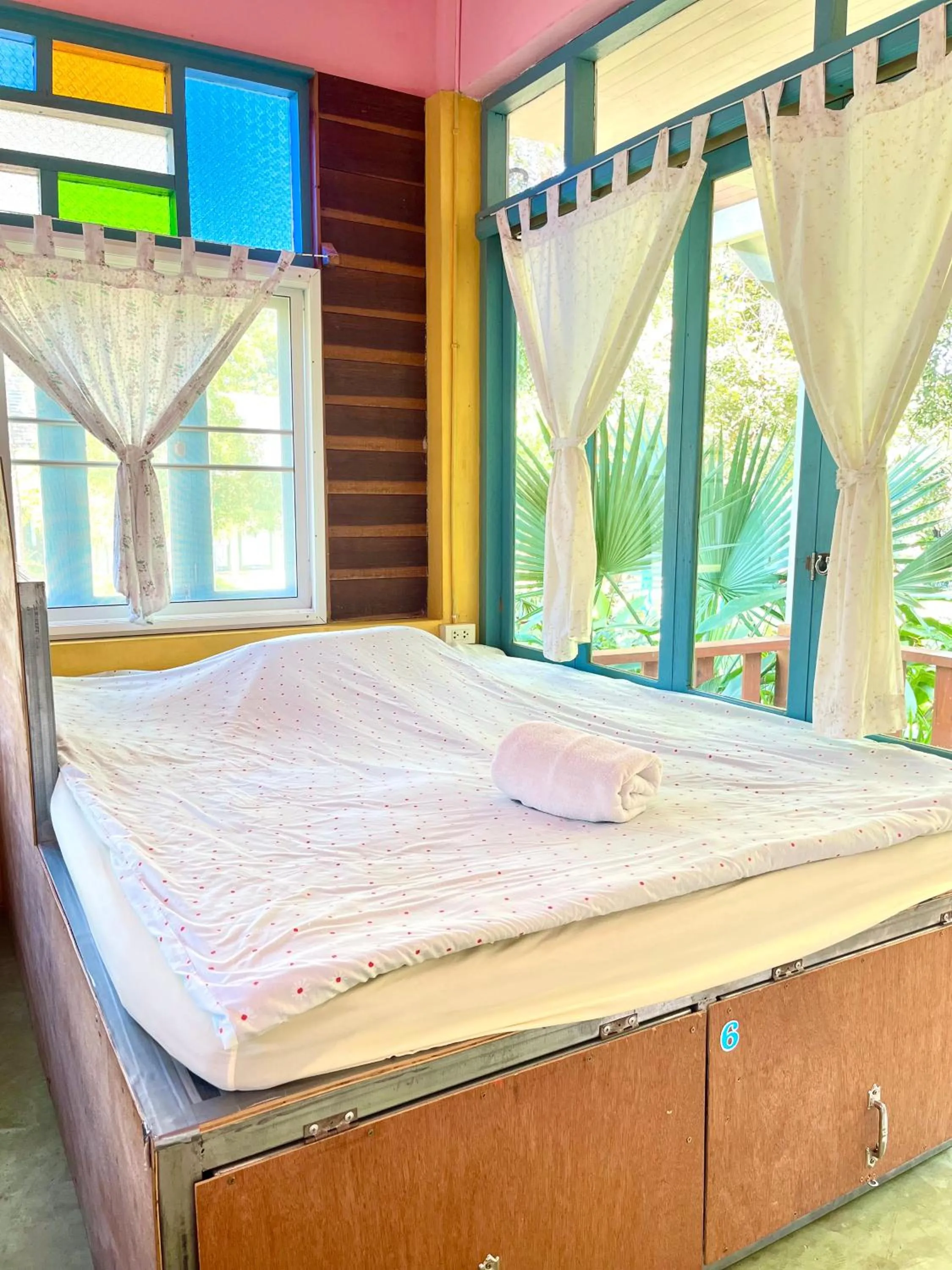 Bed in Pai Flora Resort