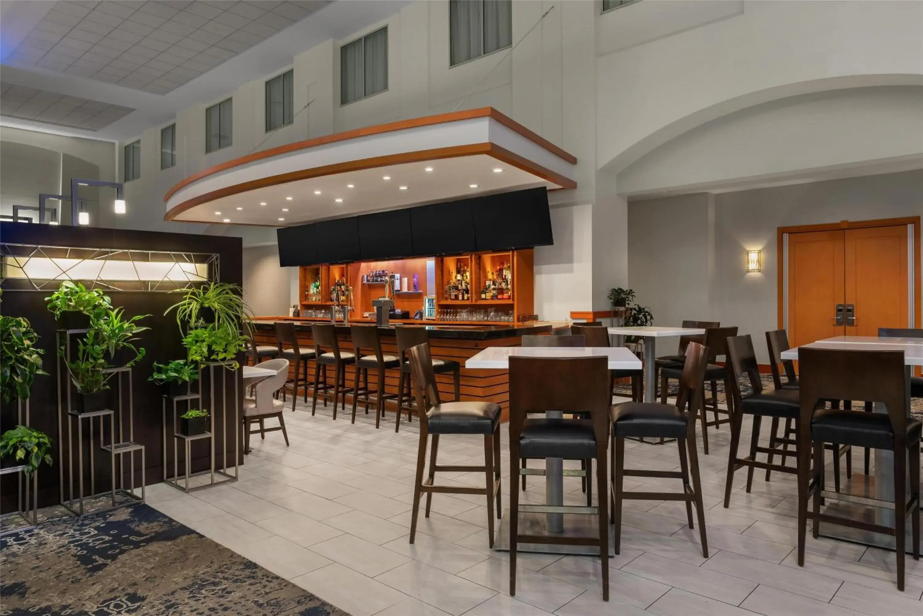 Lounge or bar in Embassy Suites Boston at Logan Airport Lounge or bar in Embassy Suites Boston at Logan Airport