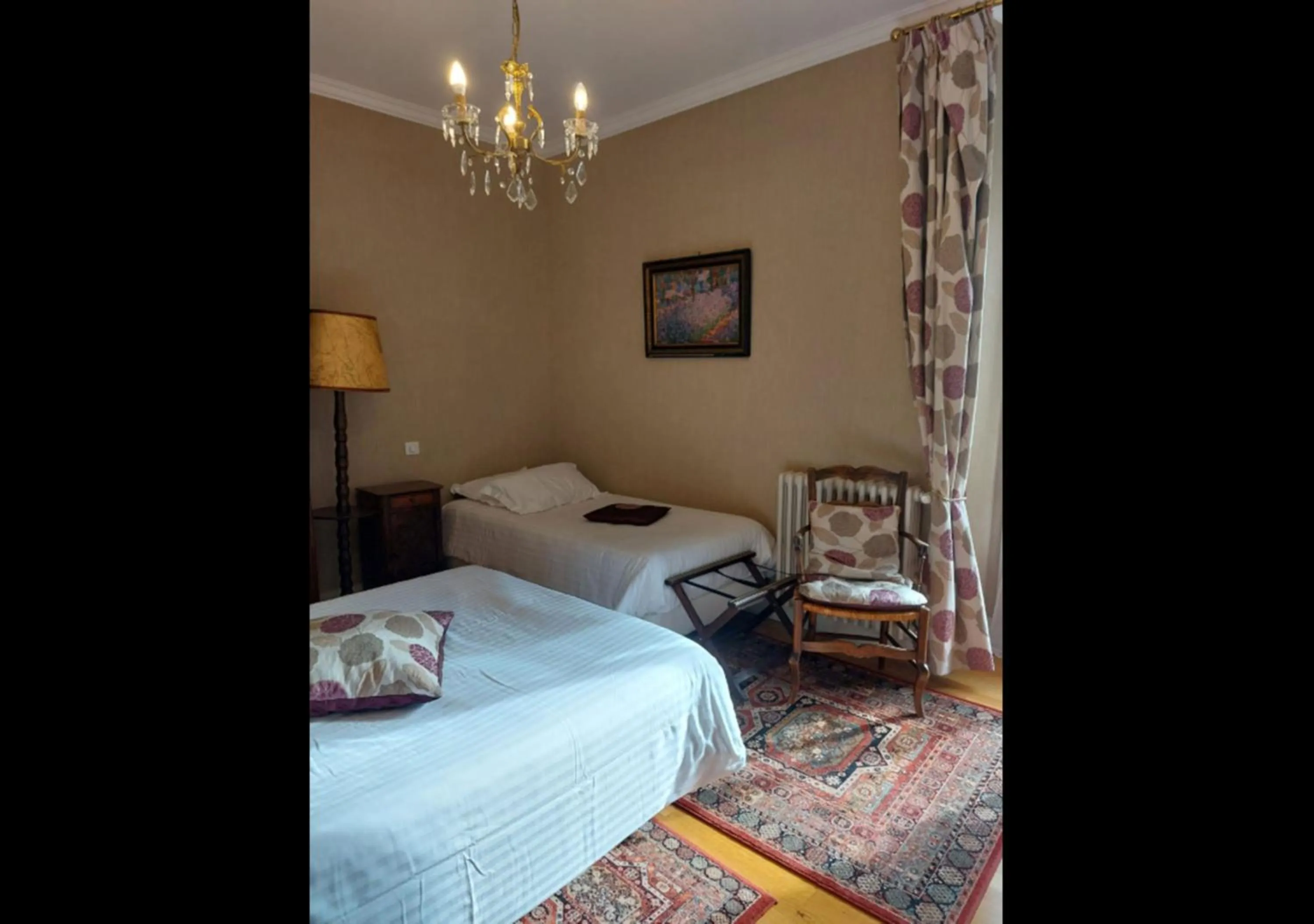 Bed in Logis Hôtel Beau Site