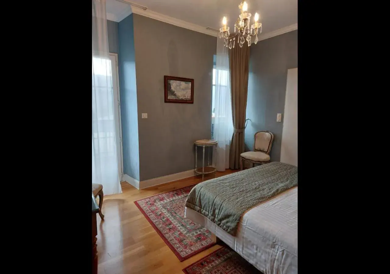 Bed in Logis Hôtel Beau Site Bed in Logis Hôtel Beau Site