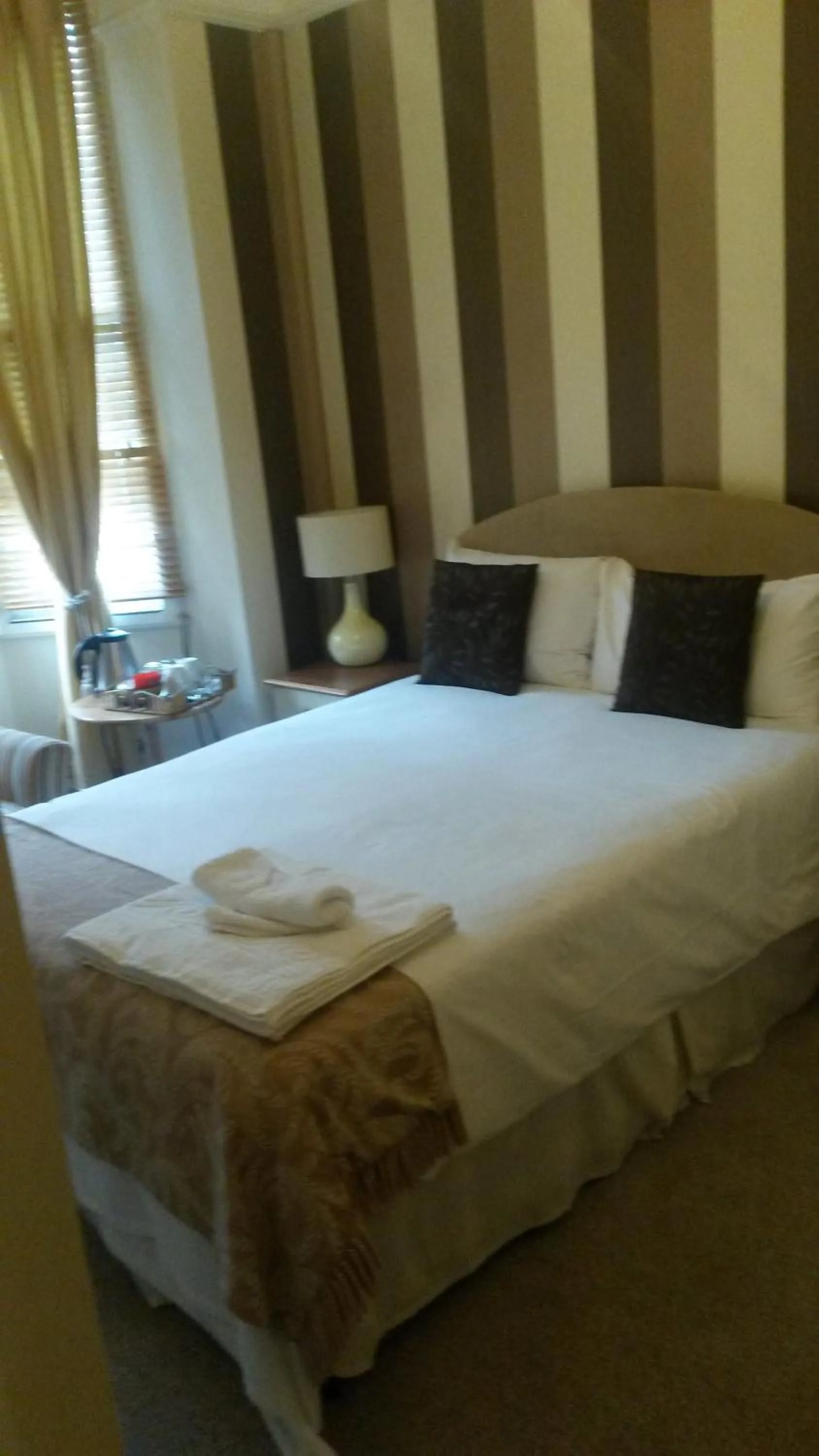 Bed in The Wimbledon Hotel