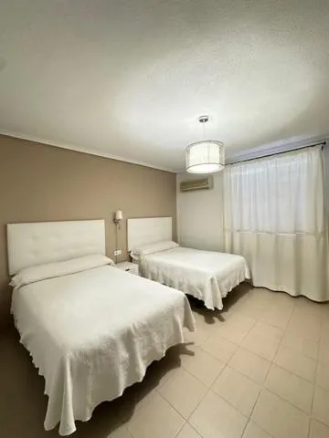 Bed in Hotel Castillo de Montemayor