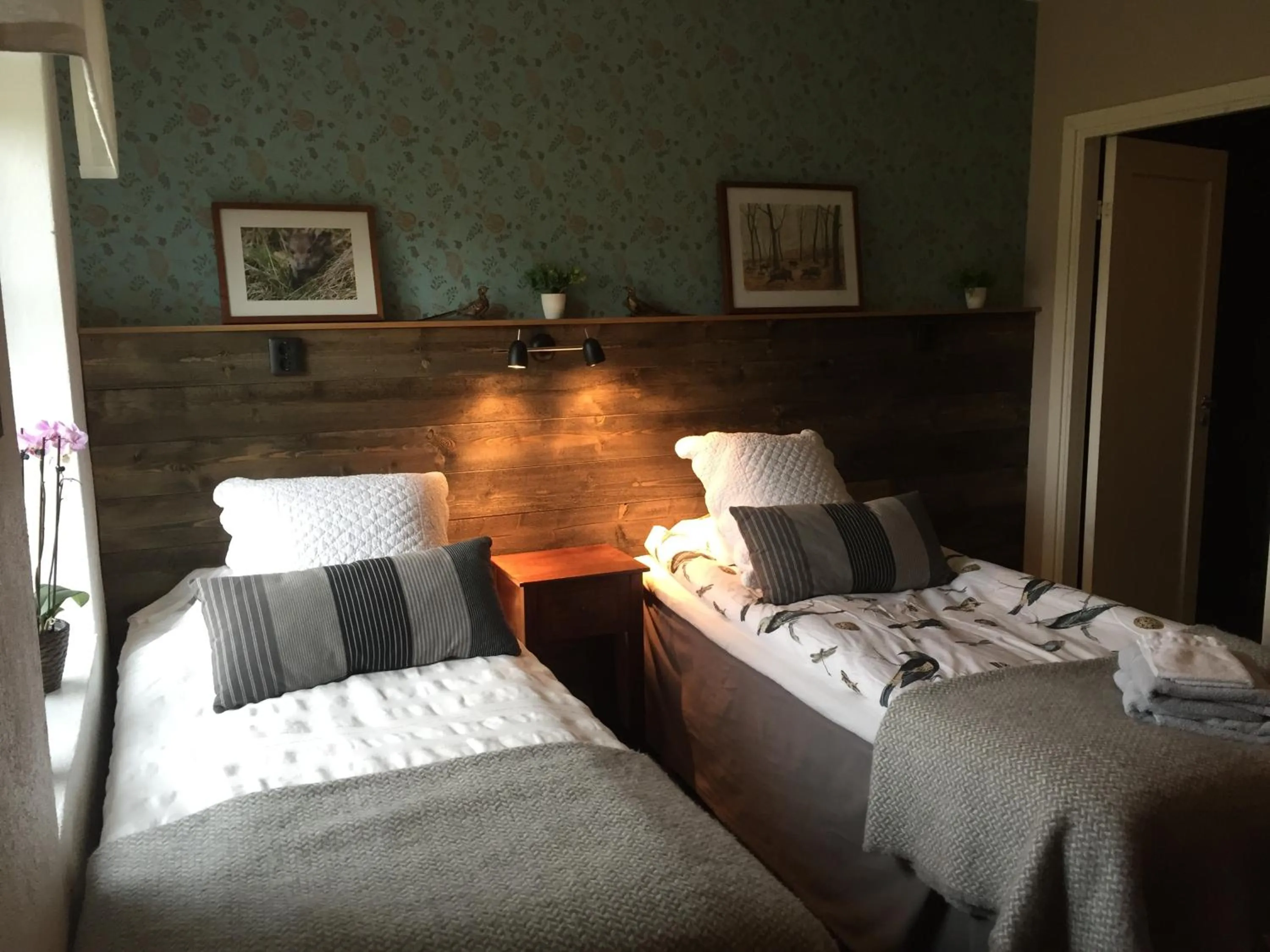 Photo of the whole room, Bed in Kuskahusen vandrarhem