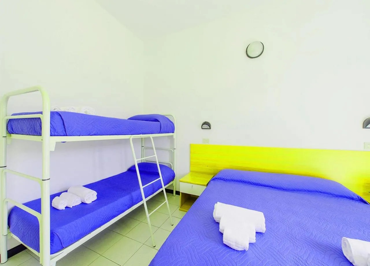 Bed in Hotel Paloma Beach Front Chiringuitos Time